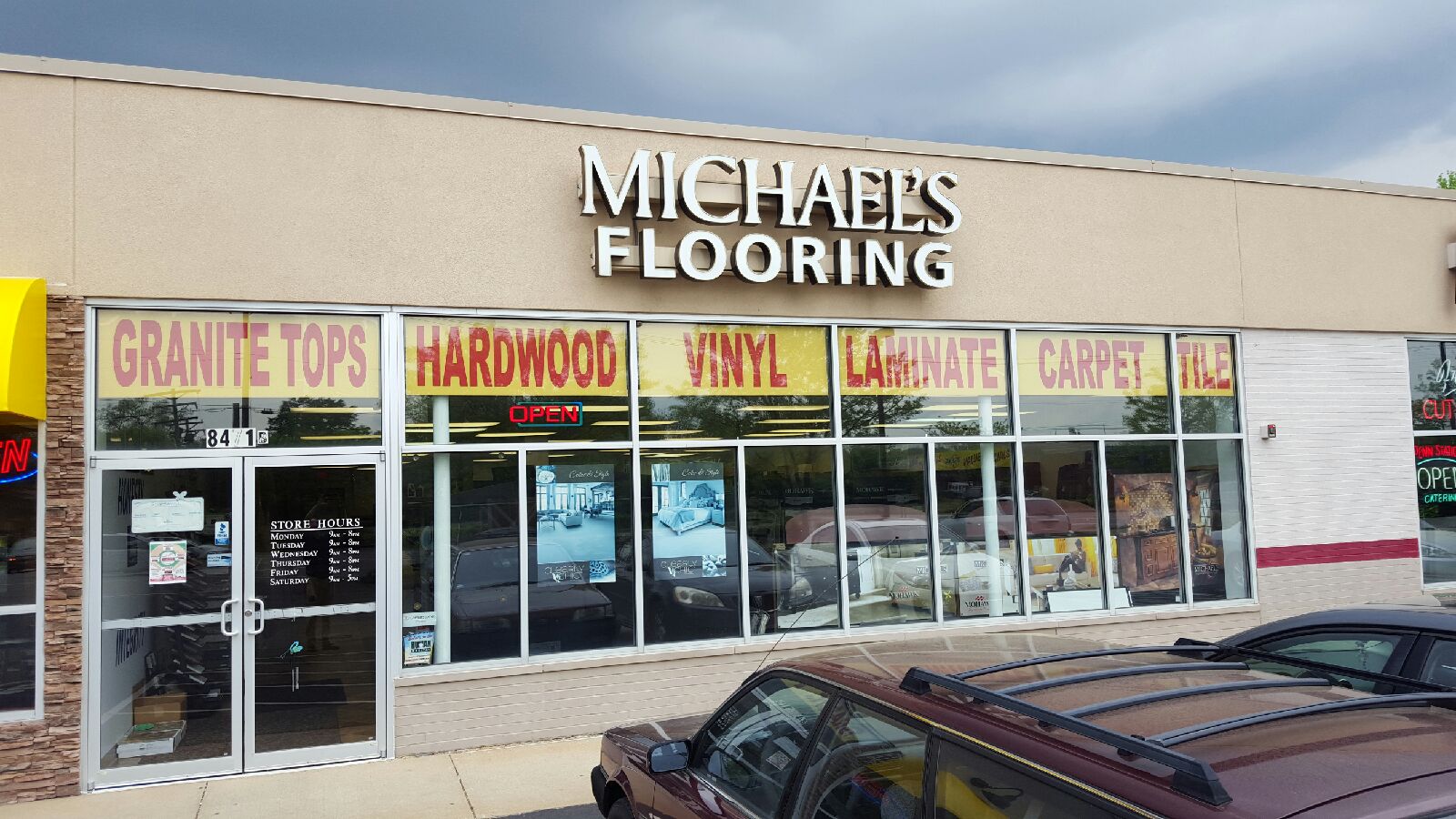 Logo for Michael's Flooring Outlet's