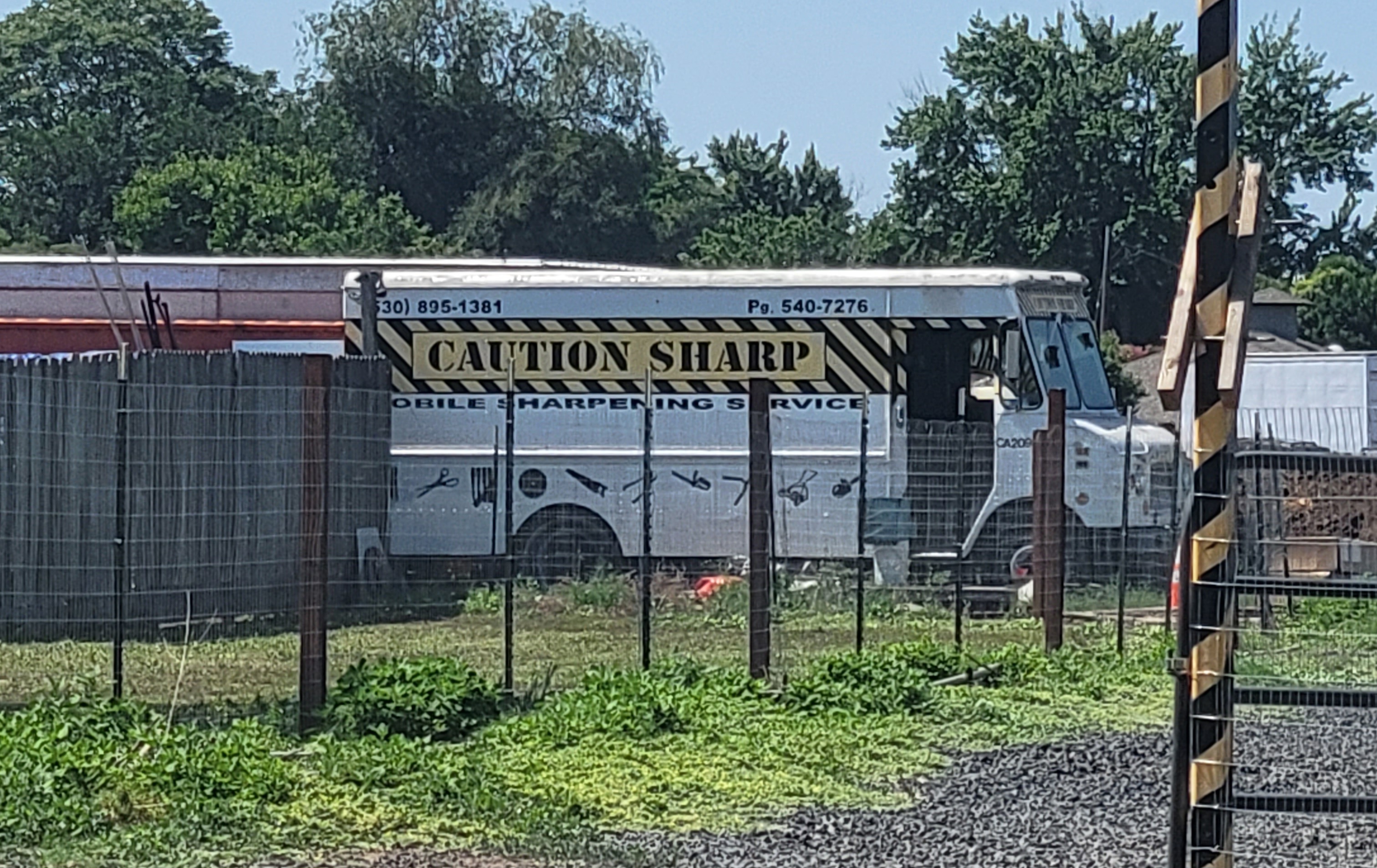 Caution Sharp logo