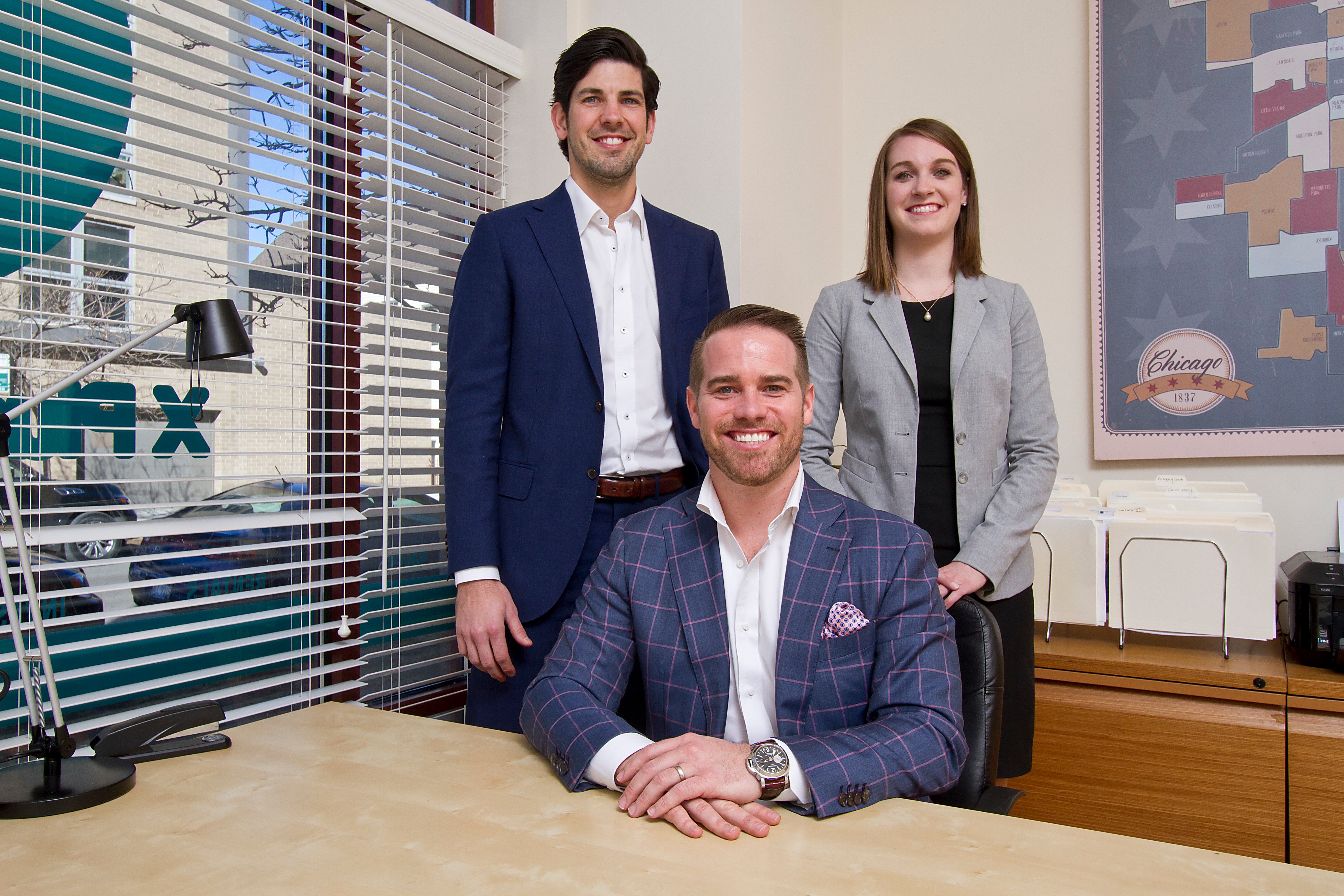 X Plus Real Estate logo