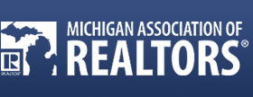 WILHELM & ASSOCIATES REALTORS logo