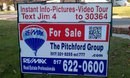 Jim and Pam Pitchford at Remax logo