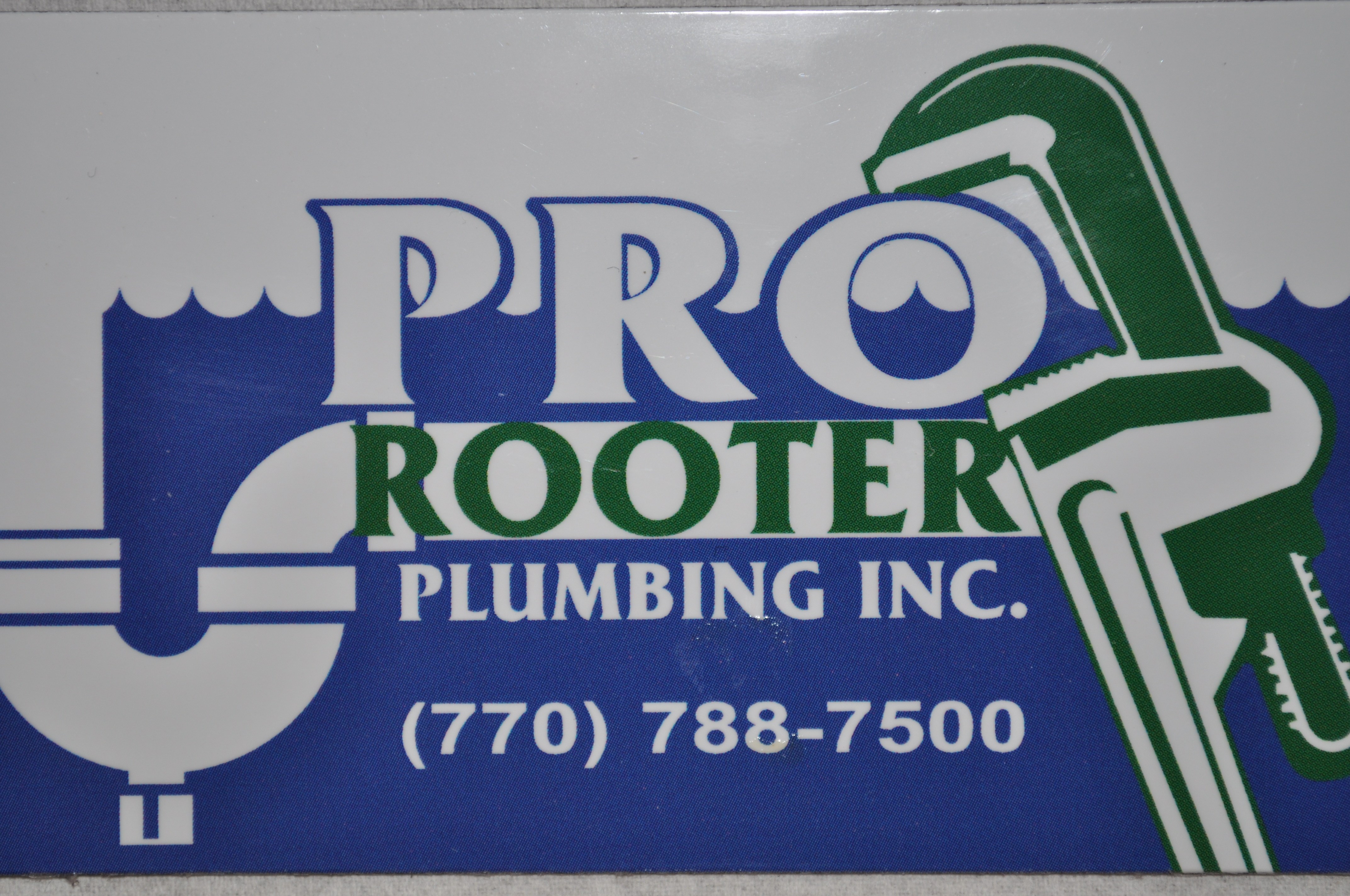 PRO ROOTER PLUMBING logo