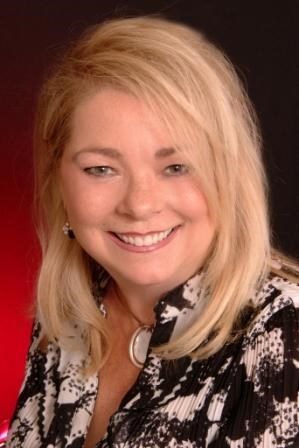 Judy McCoy with Comey & Shepherd logo