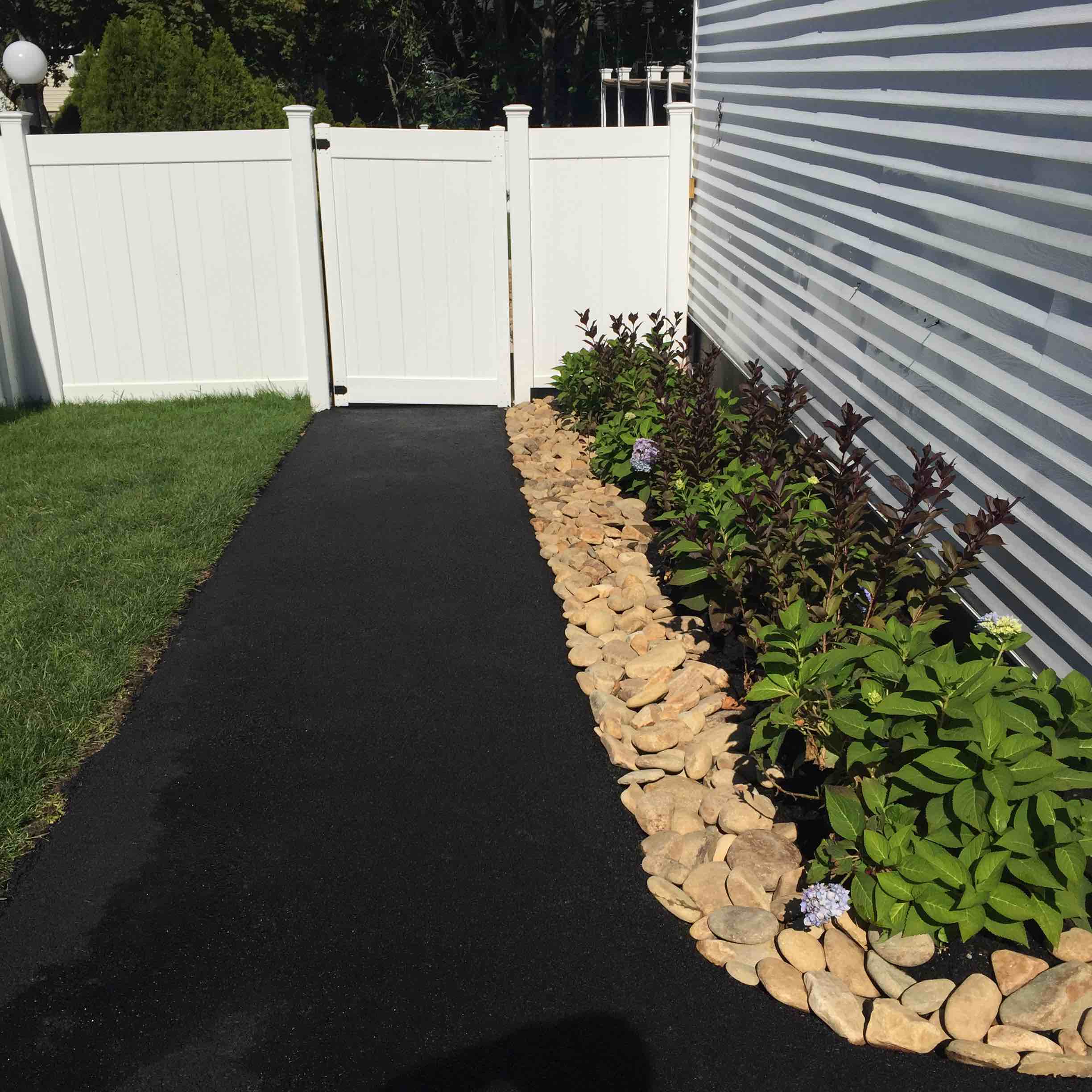 Bostonian Landscaping & Property Maintenance logo