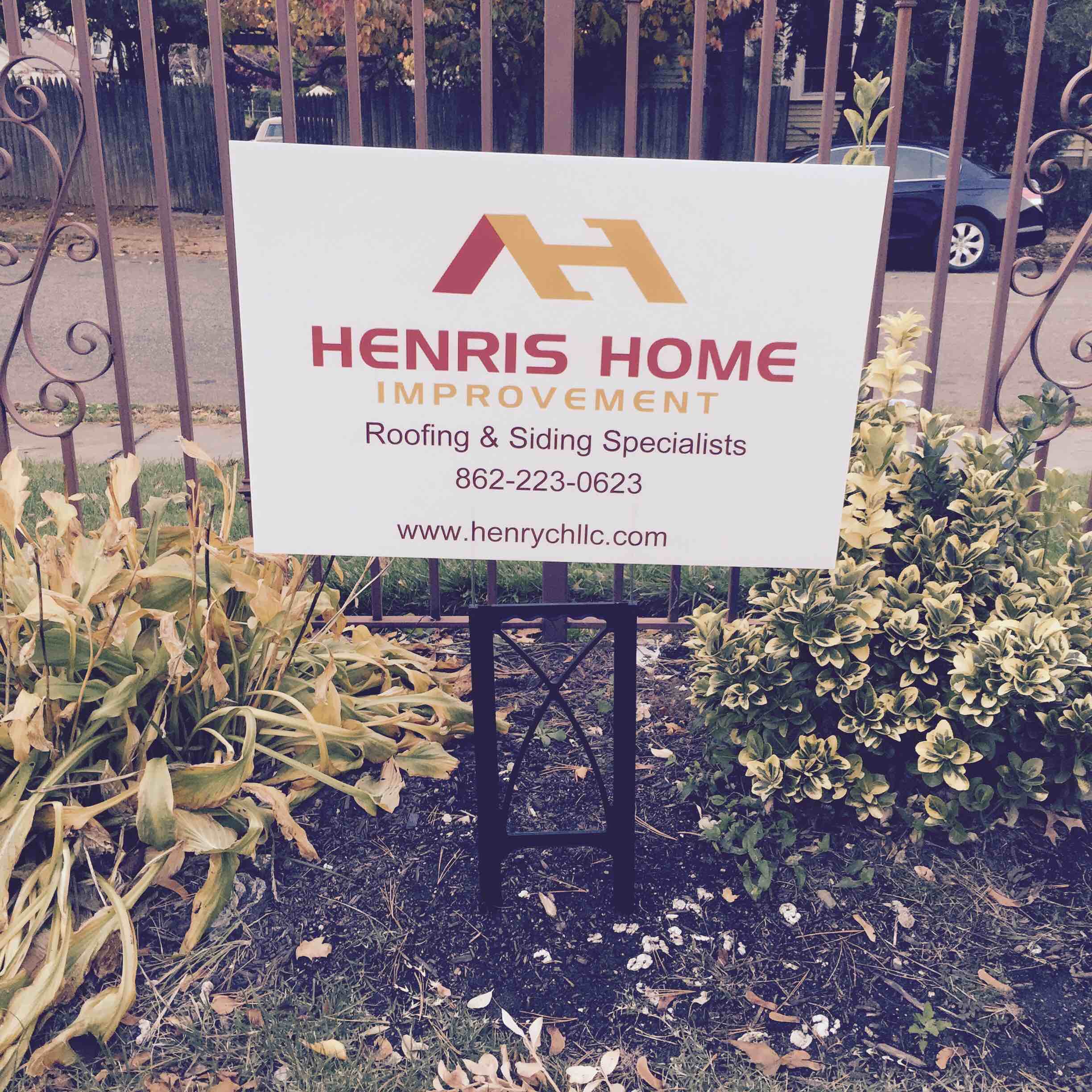 Henris Home Improvement logo