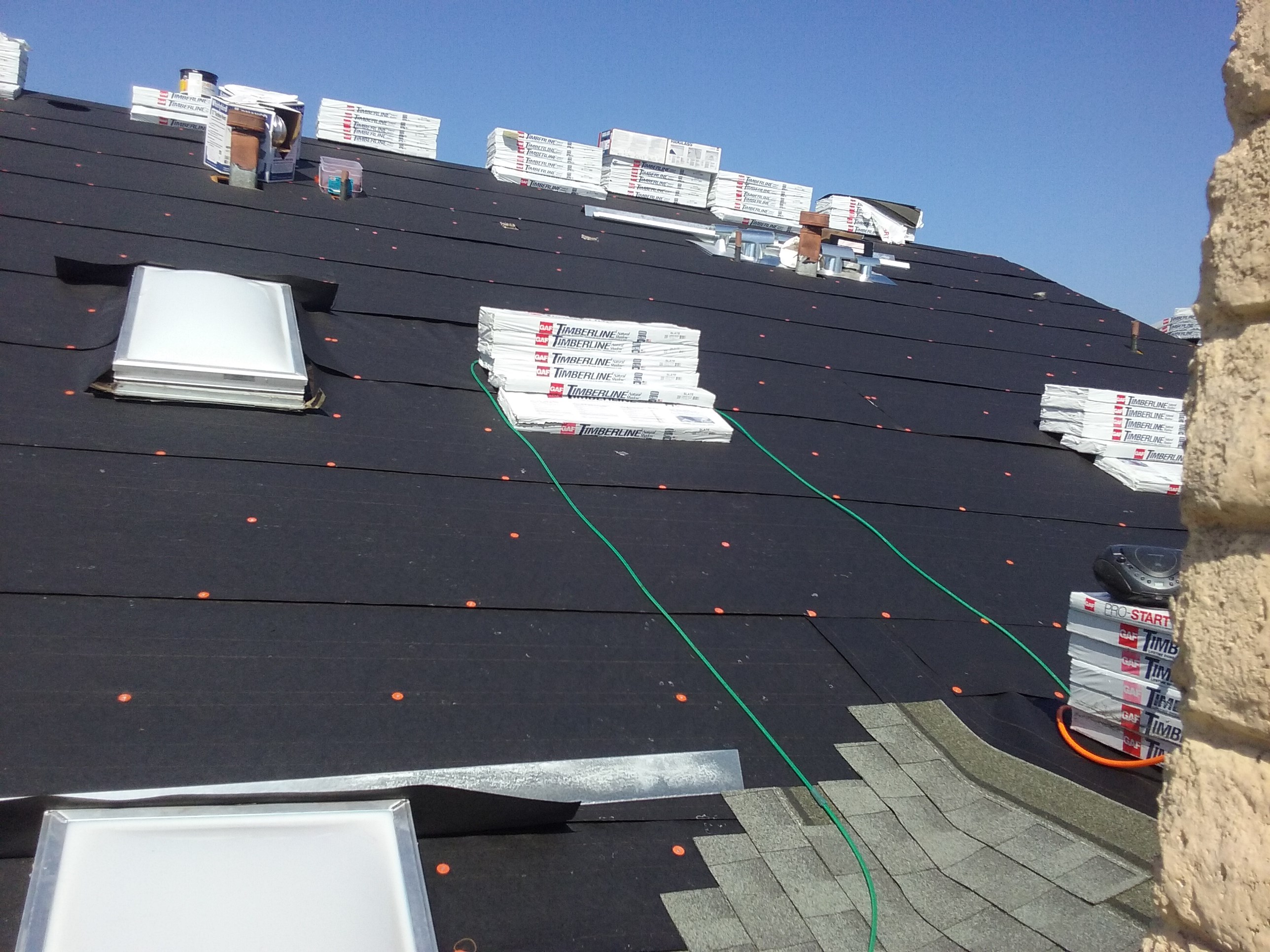 Over The Top Roofing logo