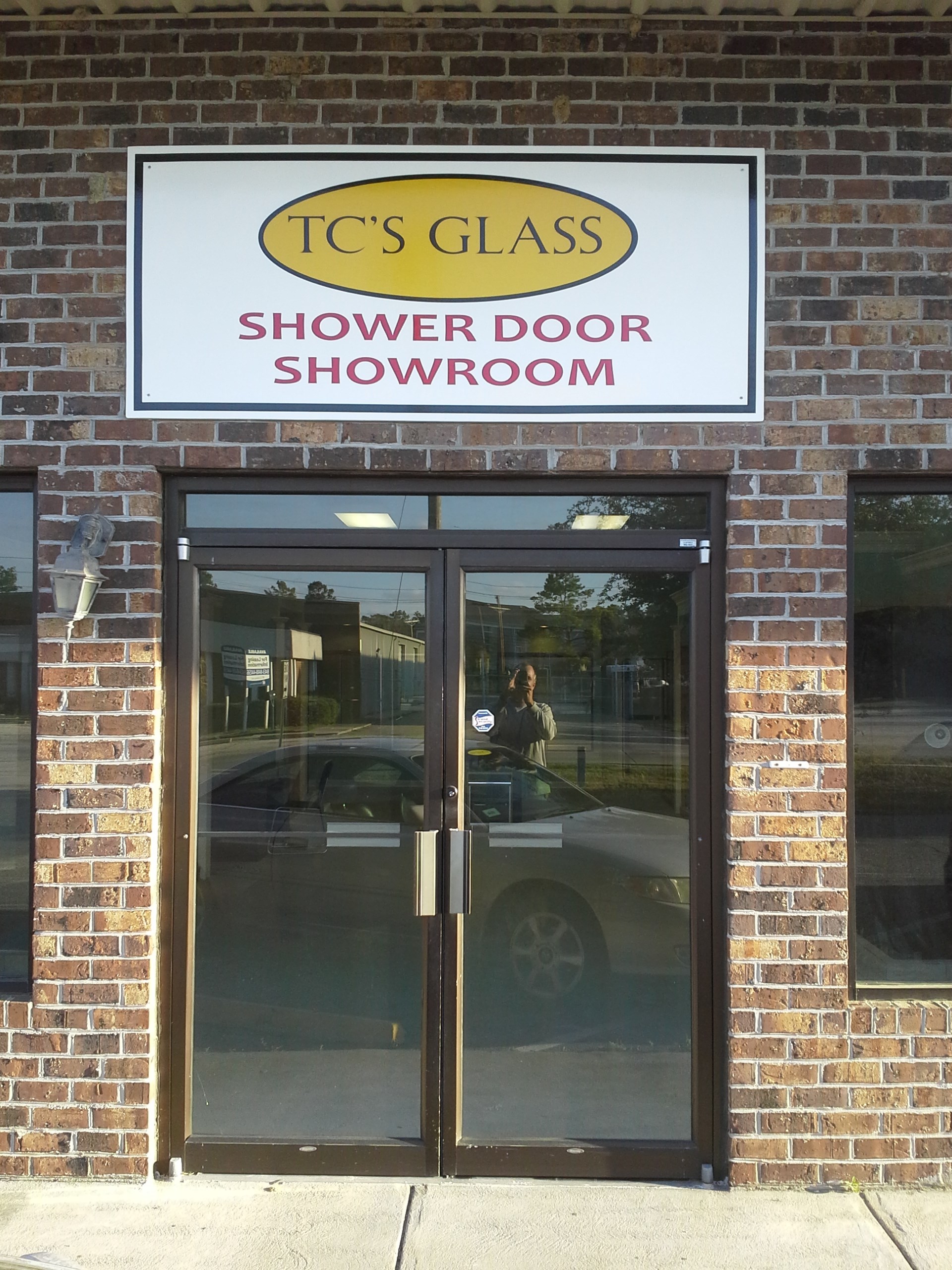Logo for TC'S Glass Service, LLC