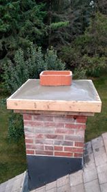 Nelsons Masonry and Sideworx logo