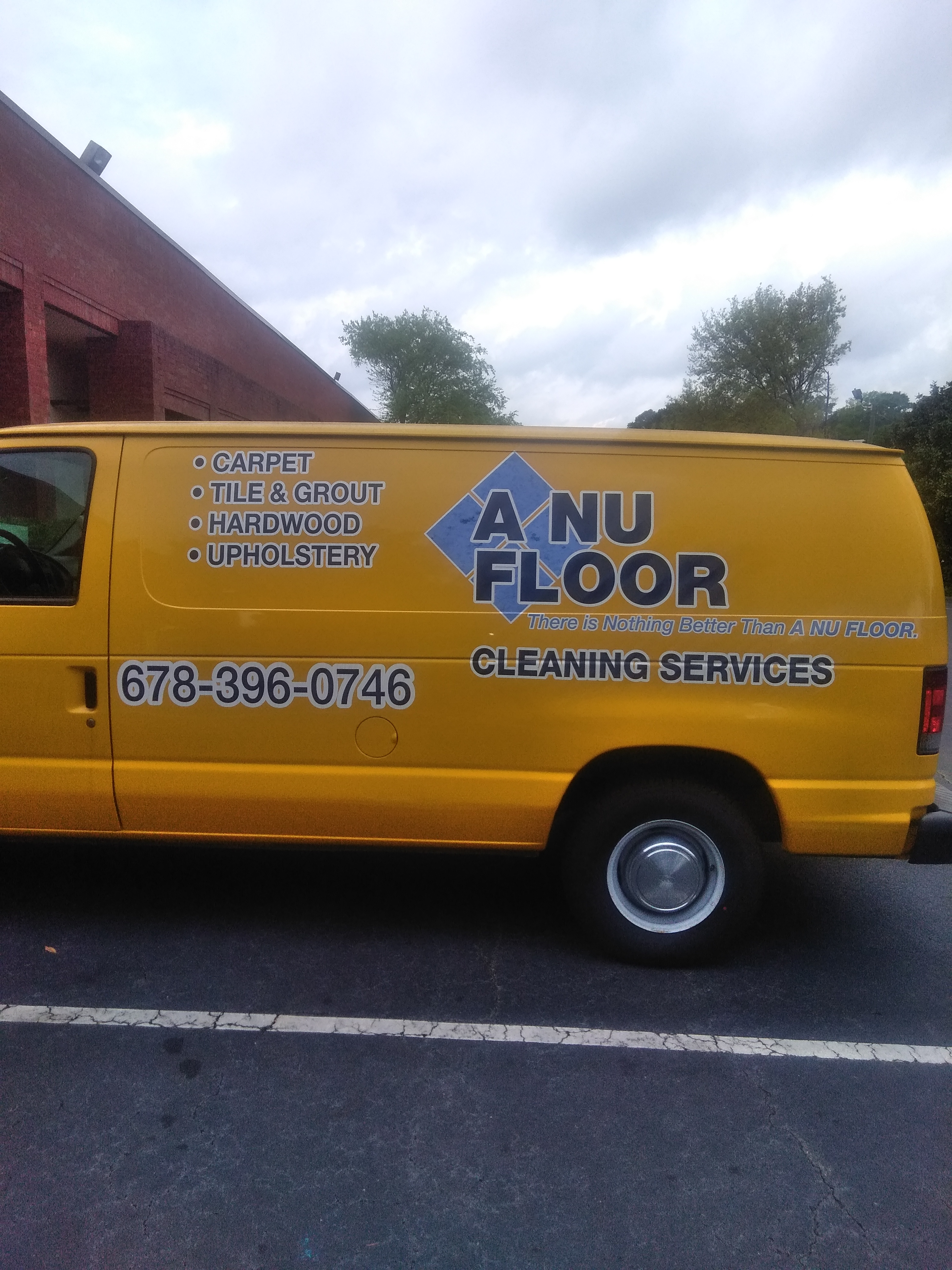A NU FLOOR CLEANING logo
