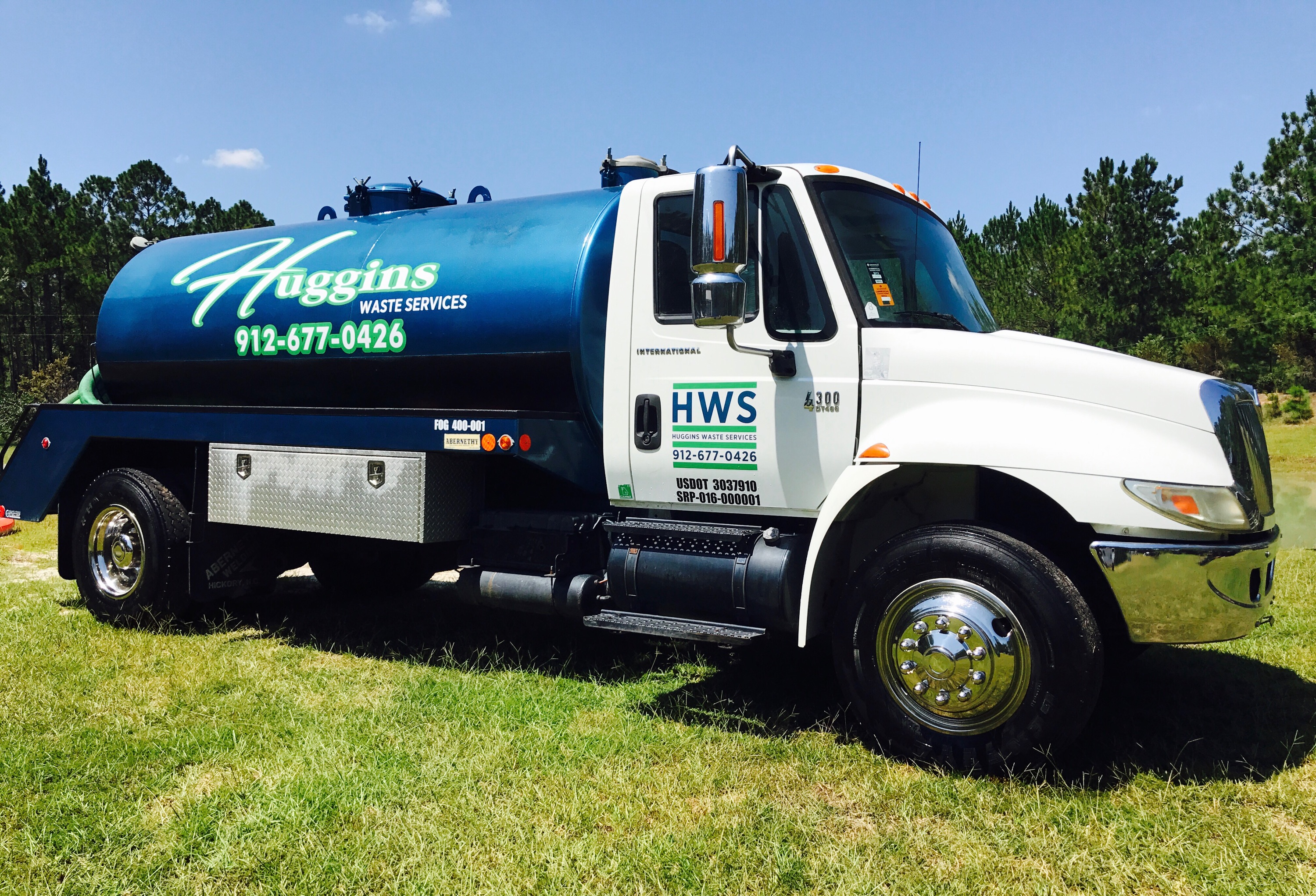 Huggins Waste Services logo