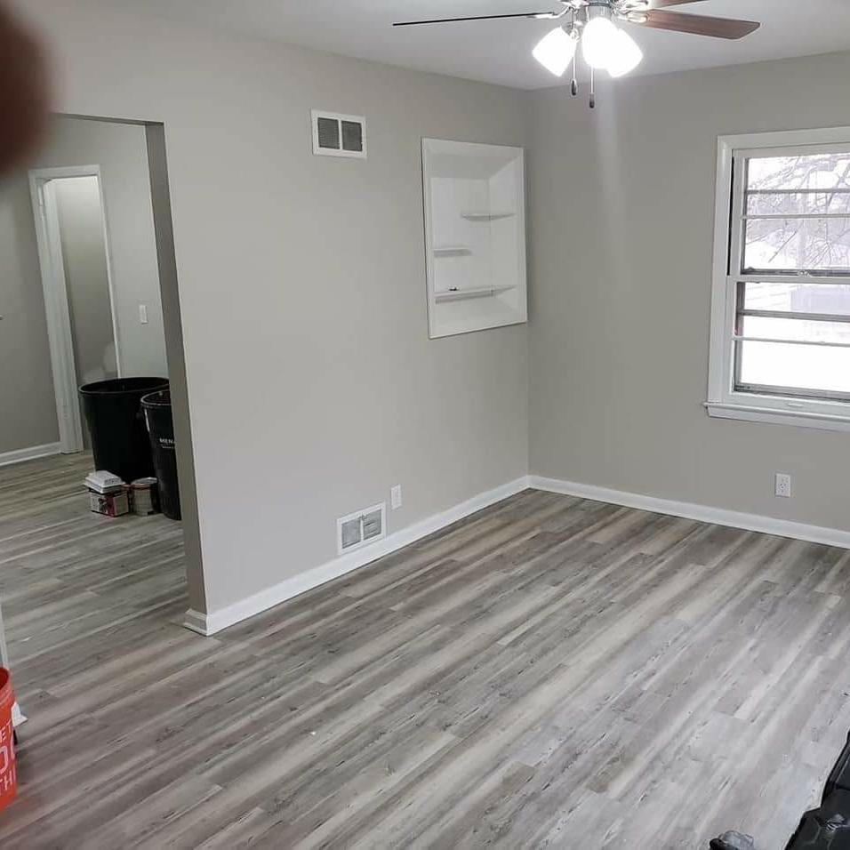 custom flooring, tile and cabnetry logo