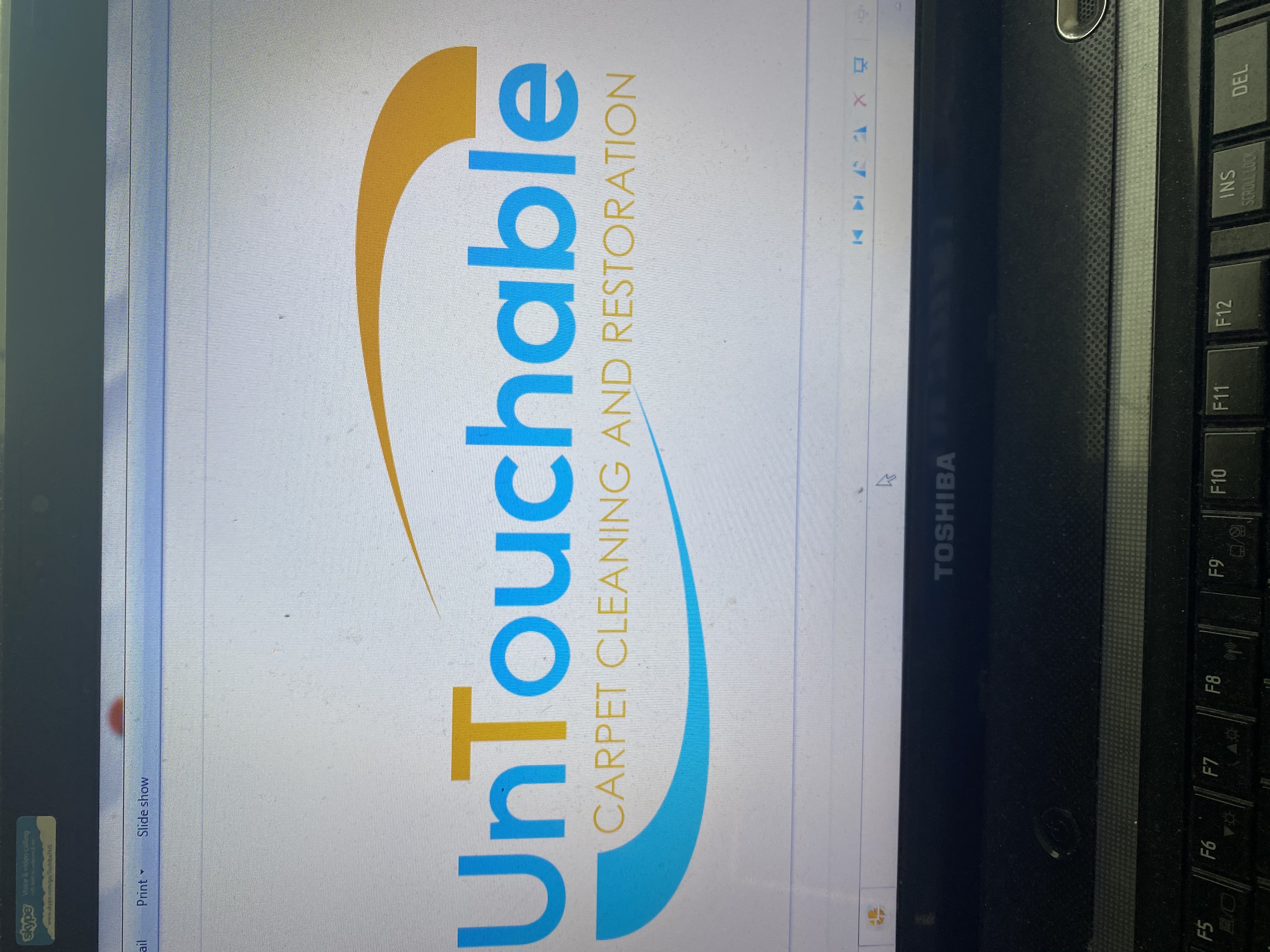 Untouchable Carpet Cleaning logo