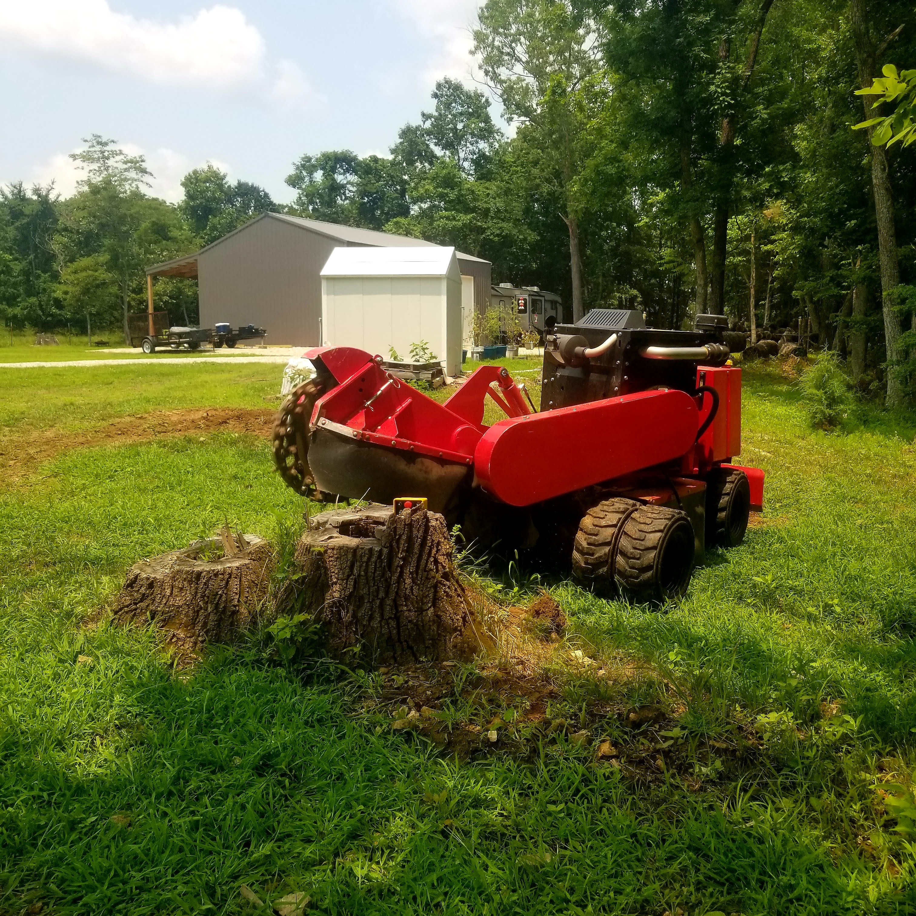 L&M Stump Grinding logo