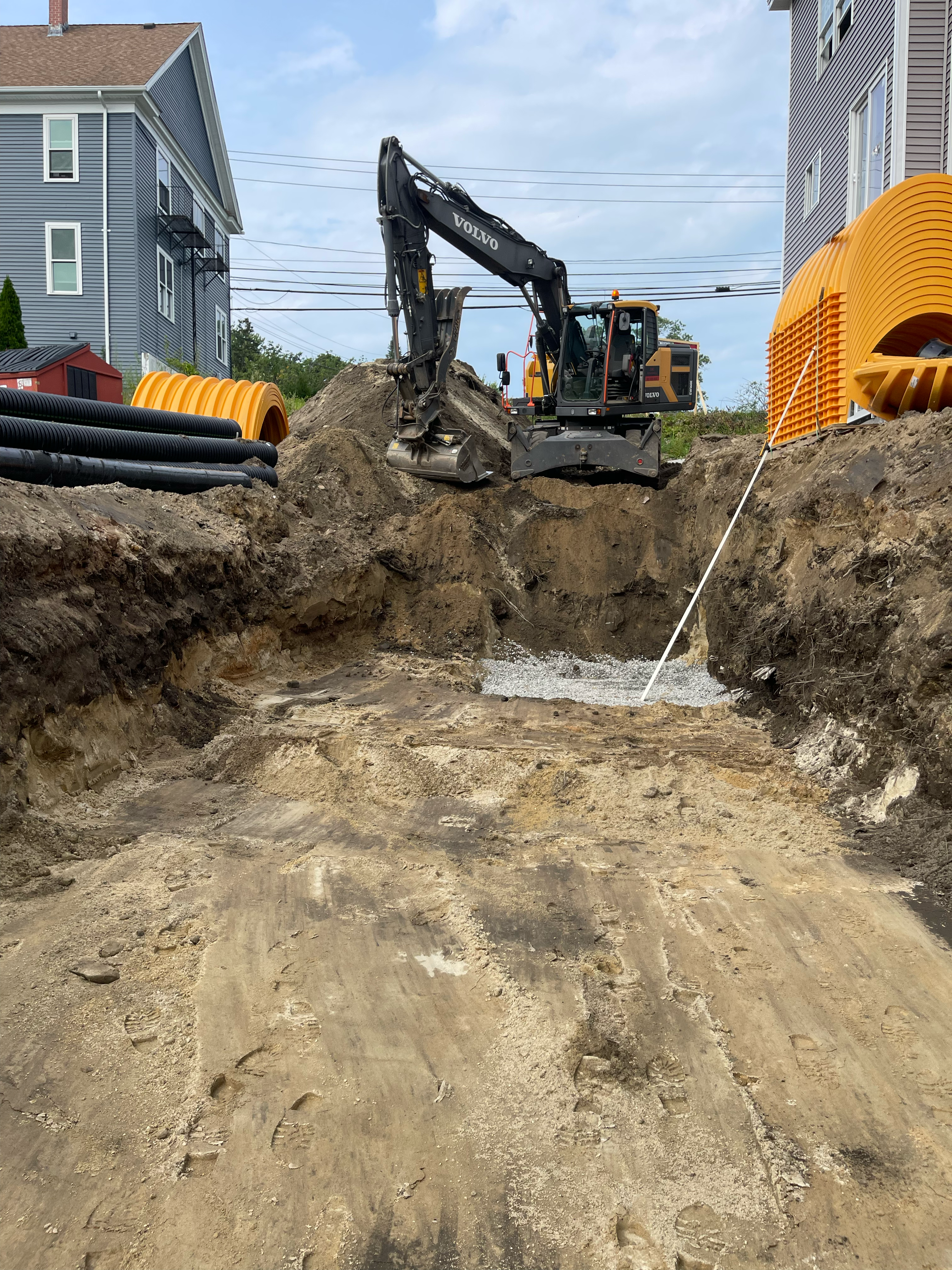 A M C EXCAVATING LLC logo
