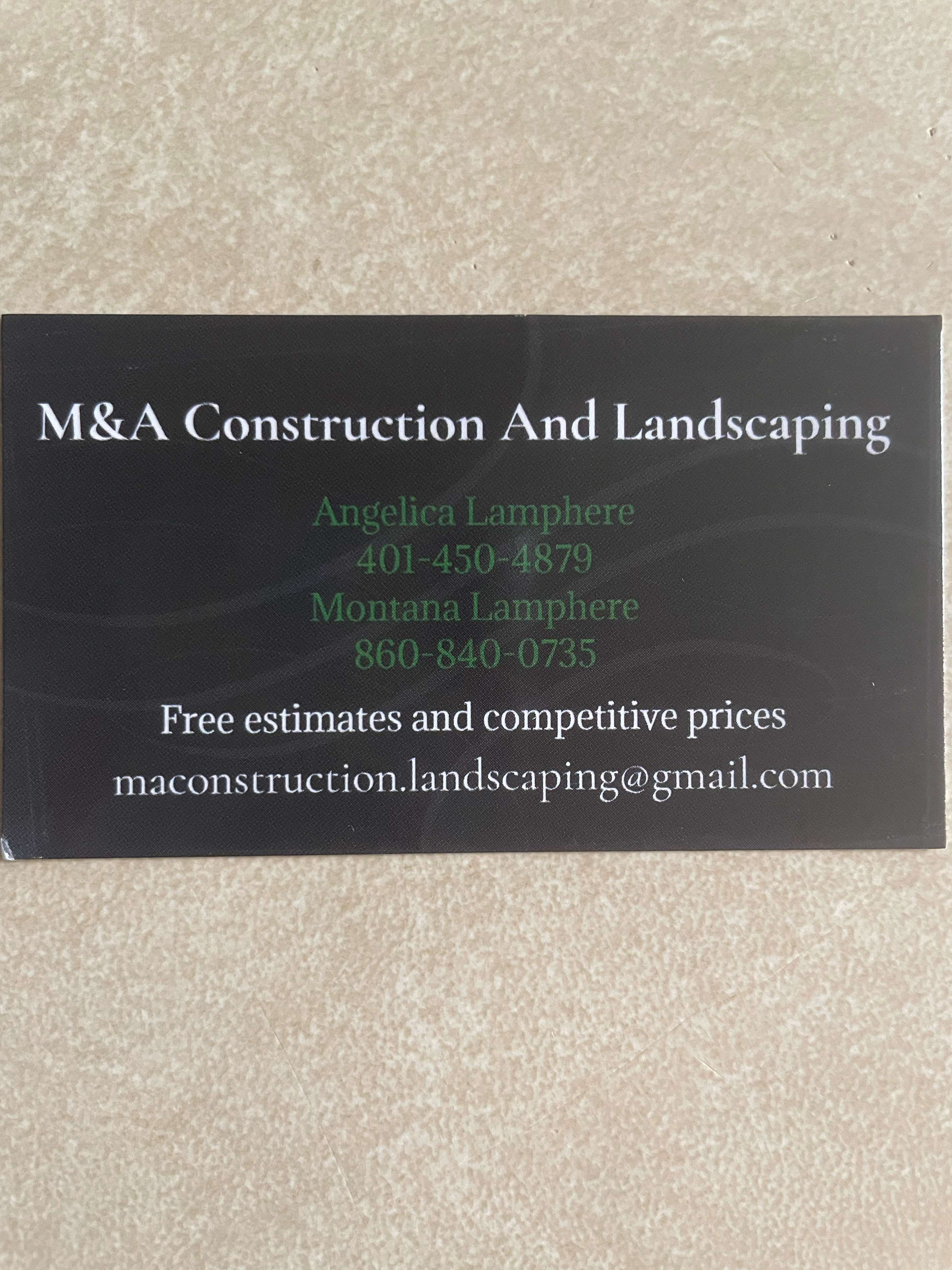 M&A Construction and Landscaping logo
