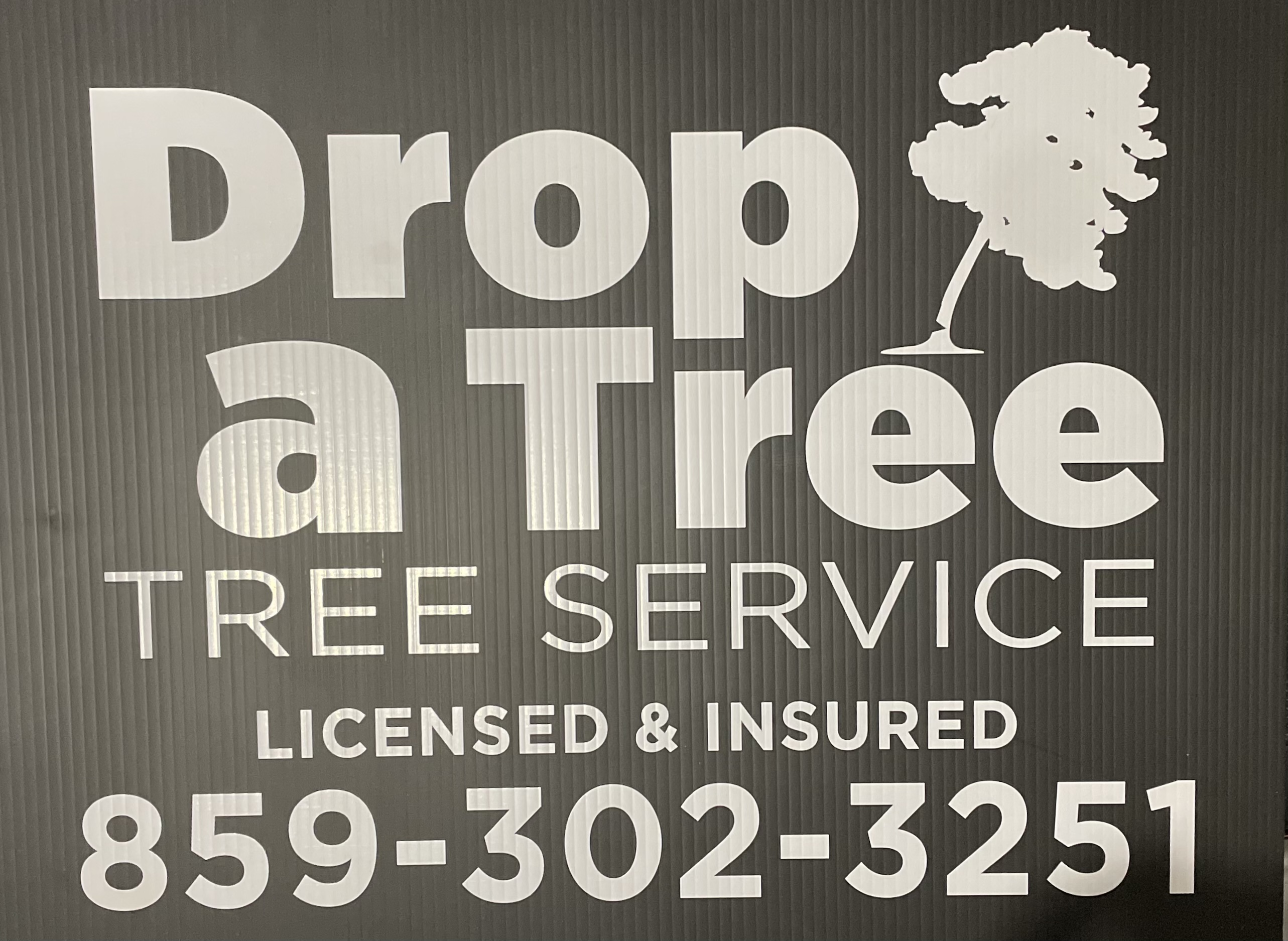 Drop A Tree, LLC logo