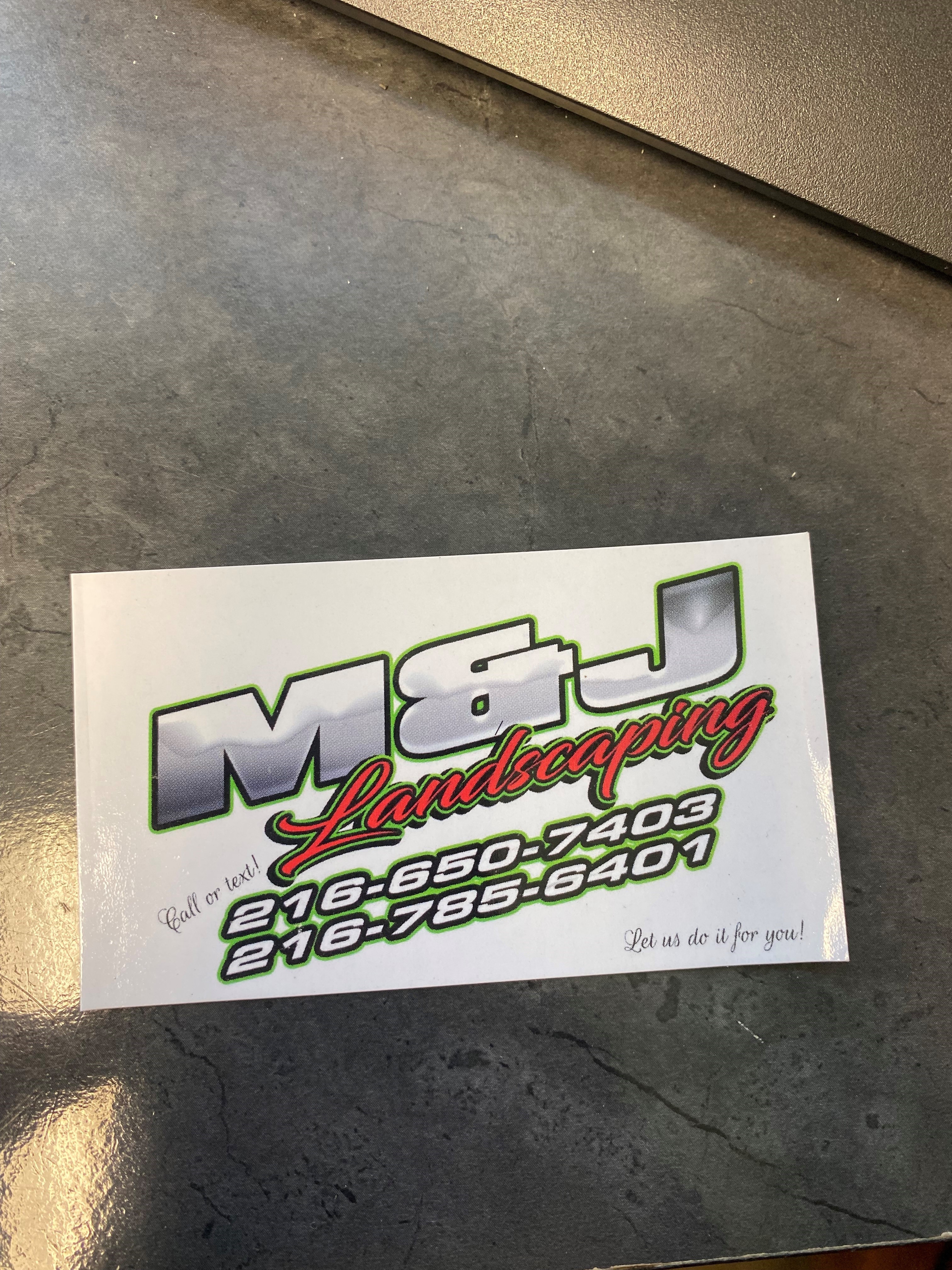 M&J Landscaping logo