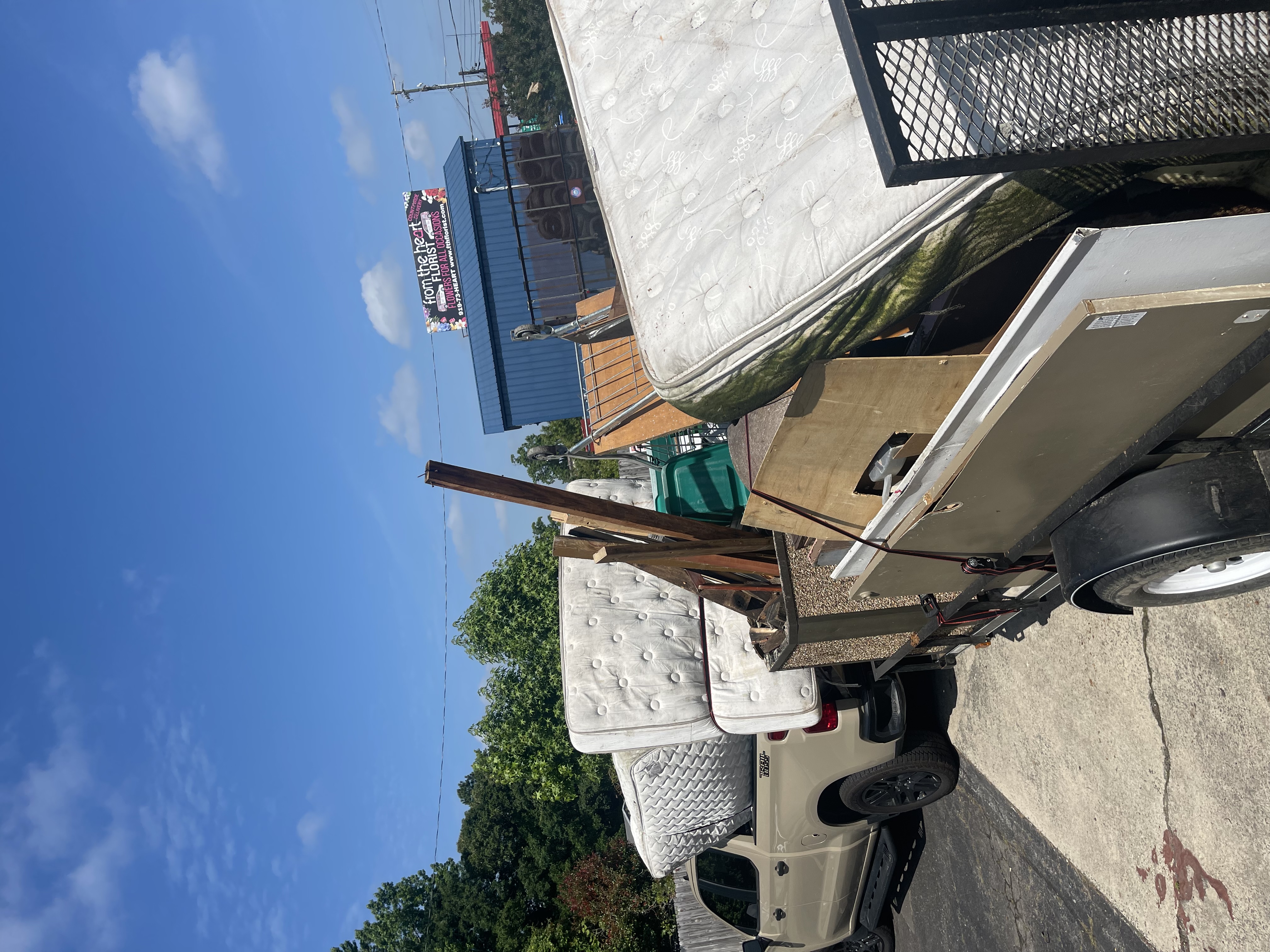 Humes Hauling & Junk Removal logo