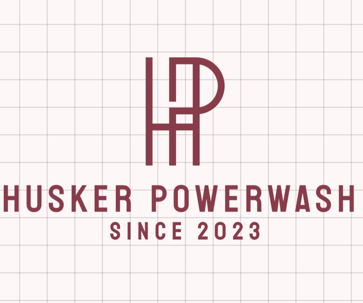 HUSKER Powerwash logo