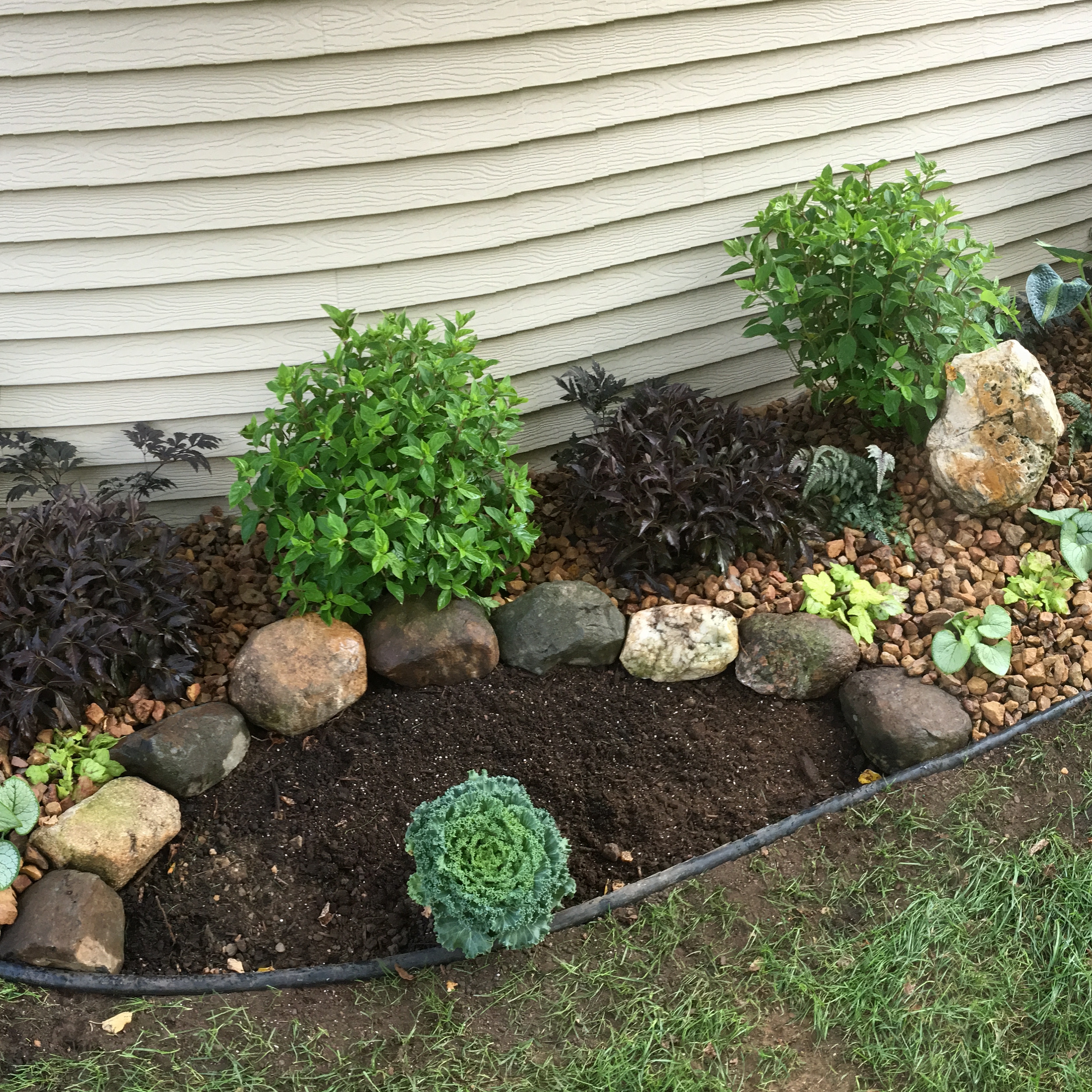 Loberg Lawn & Landscaping LLC logo
