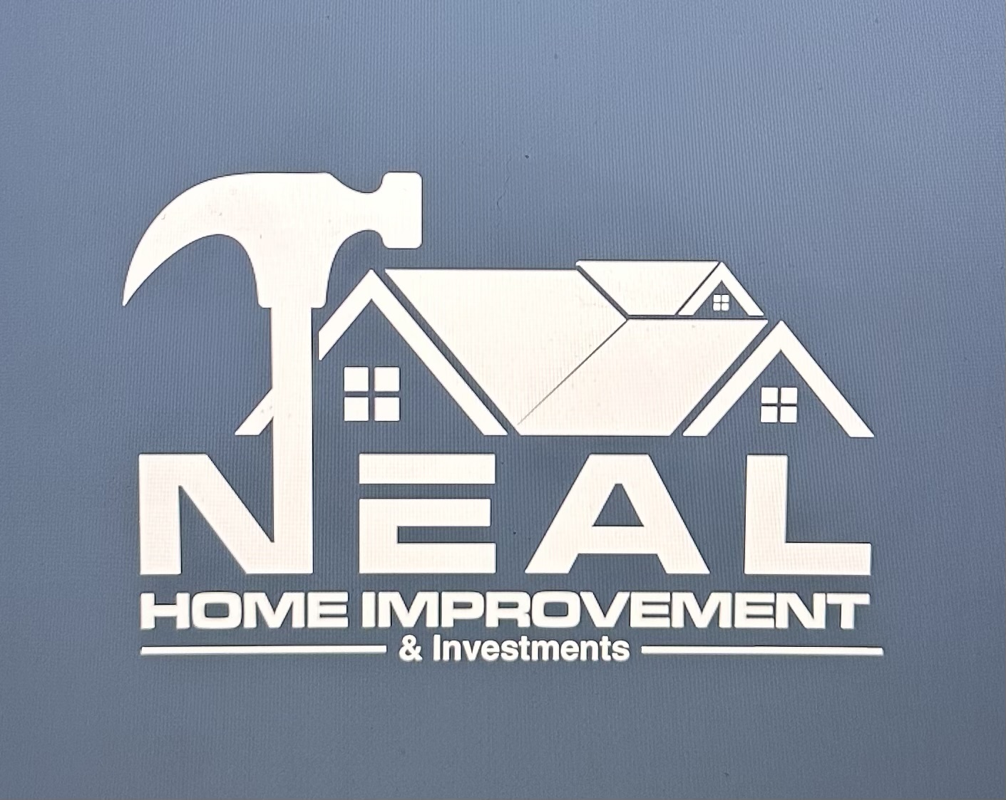 Nealhomeimrpovement logo