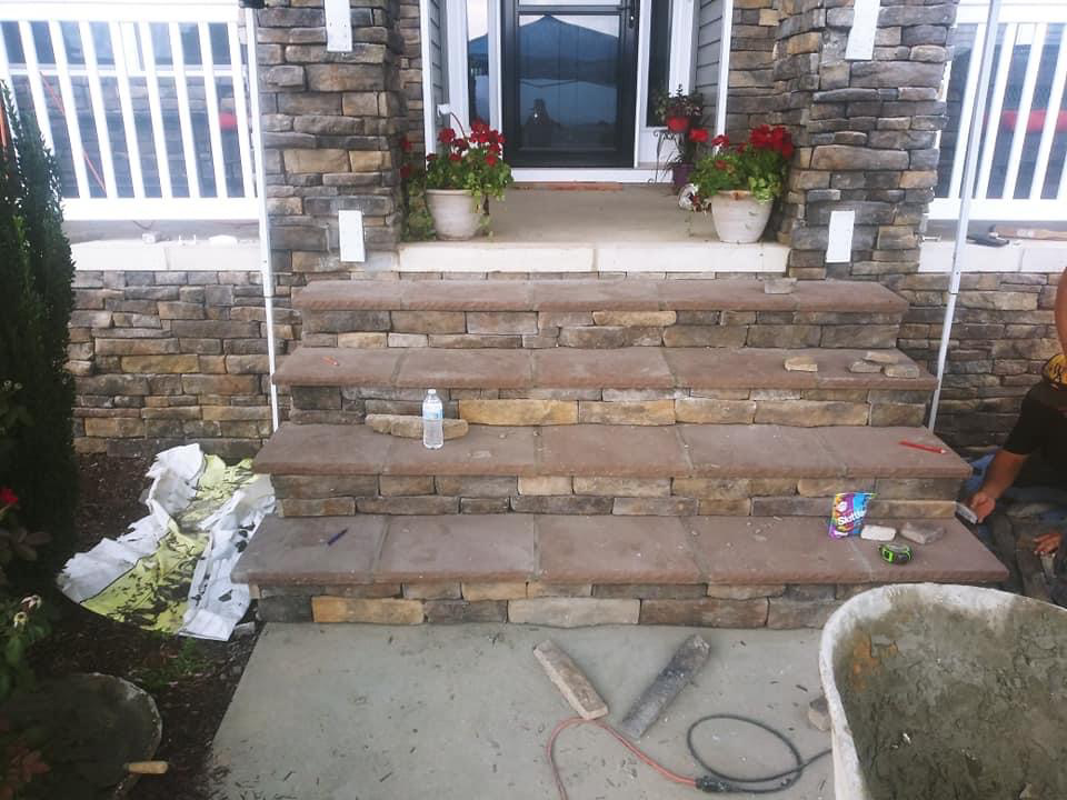 Out the mud Masonry logo