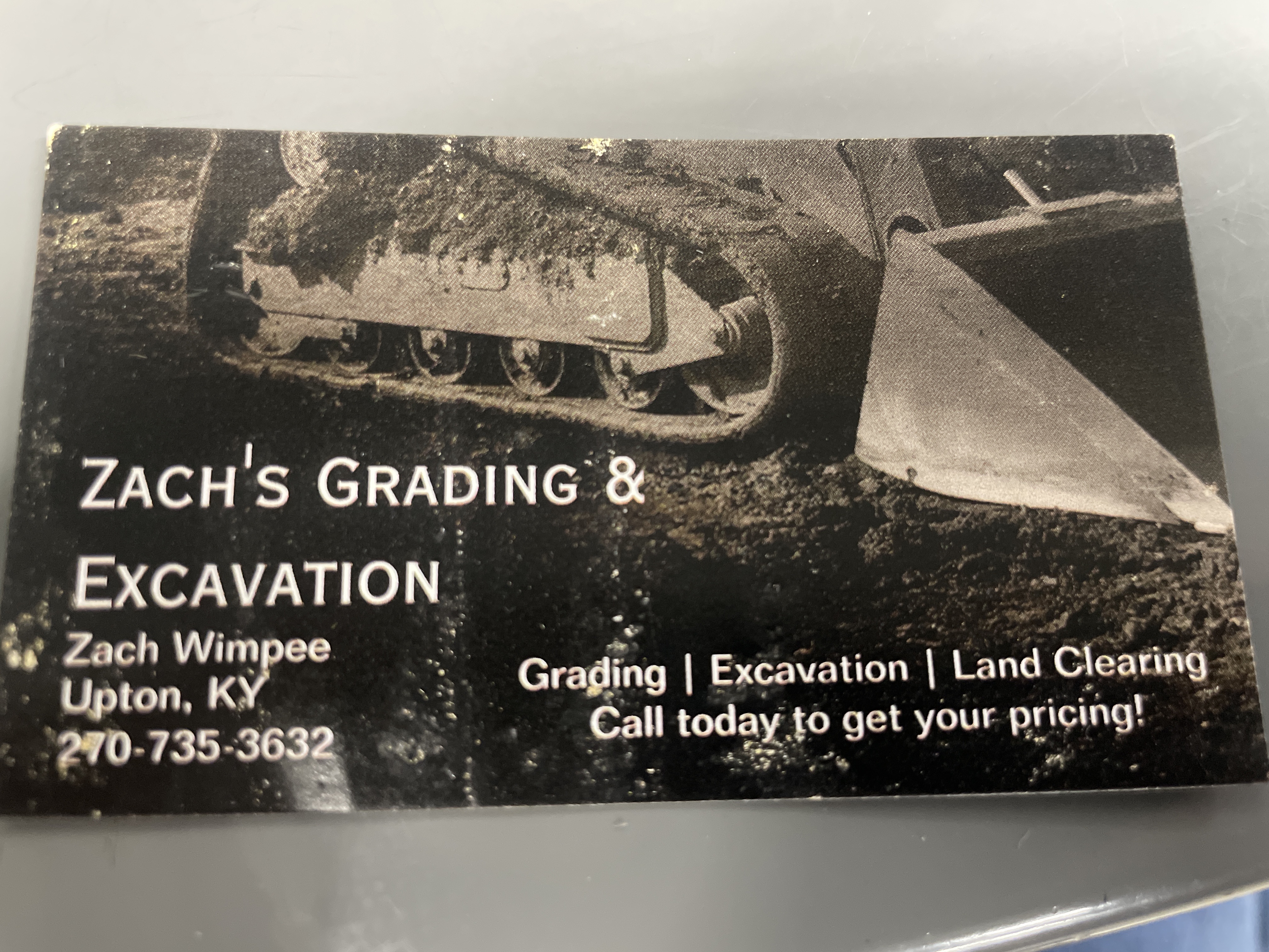 Zachs Grading & Excavation logo