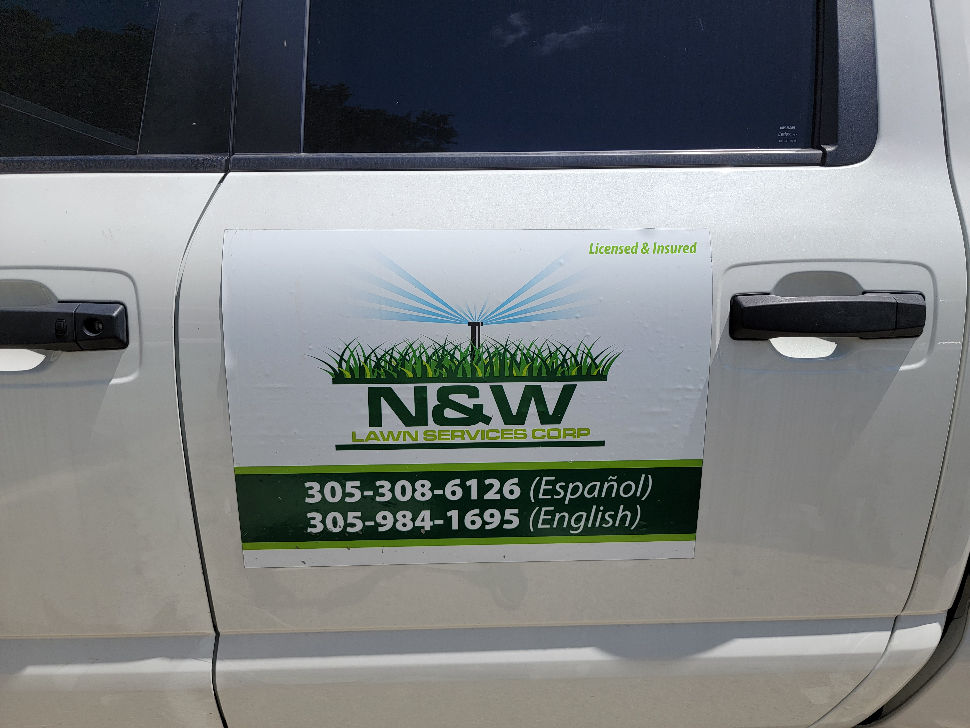 N and W Lawns logo
