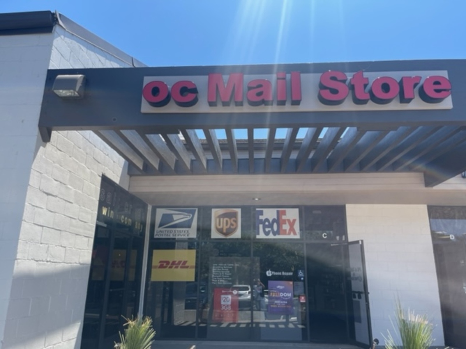 OC Mail Store logo