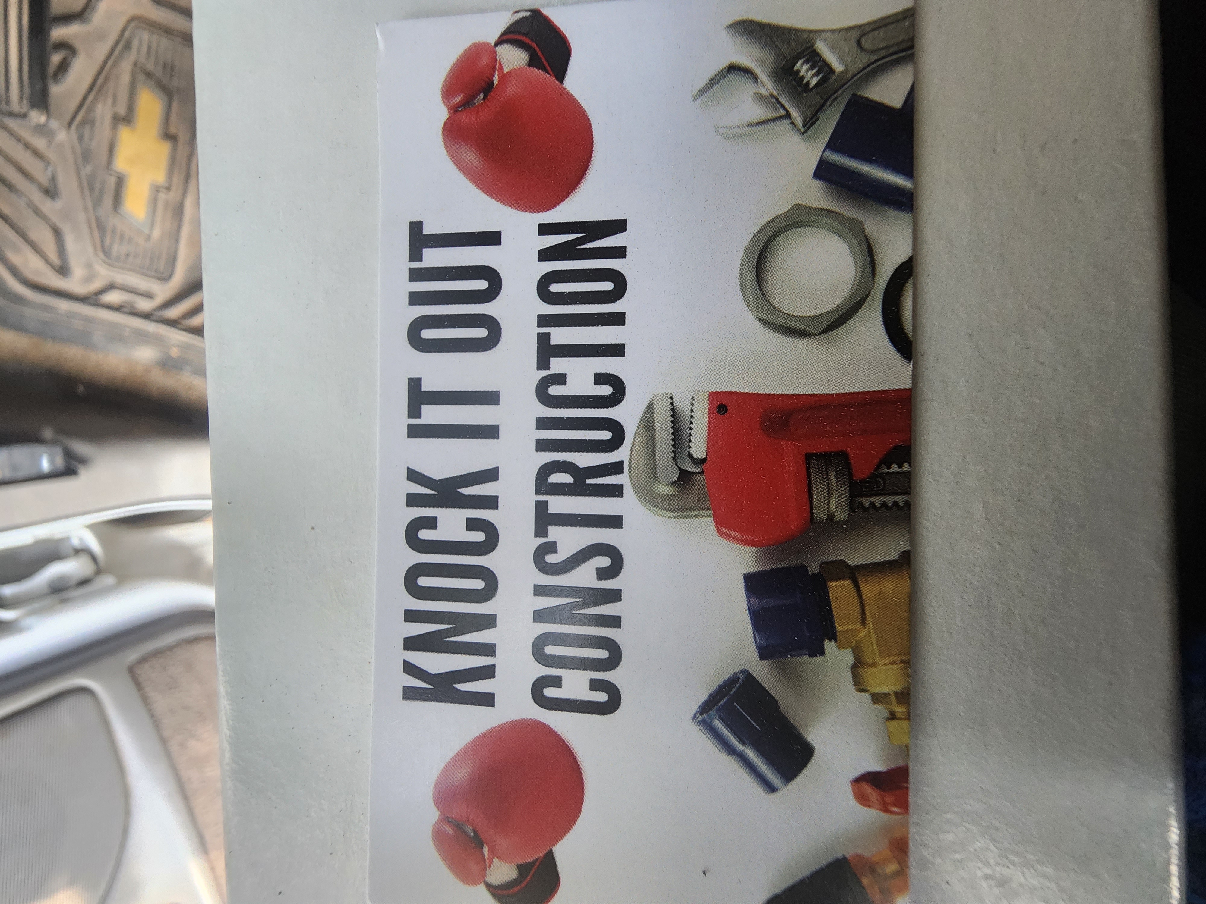KNOCK IT OUT CONSTRUCTION logo