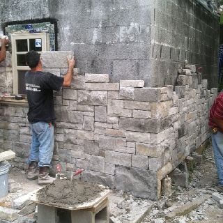 J's Masonry logo