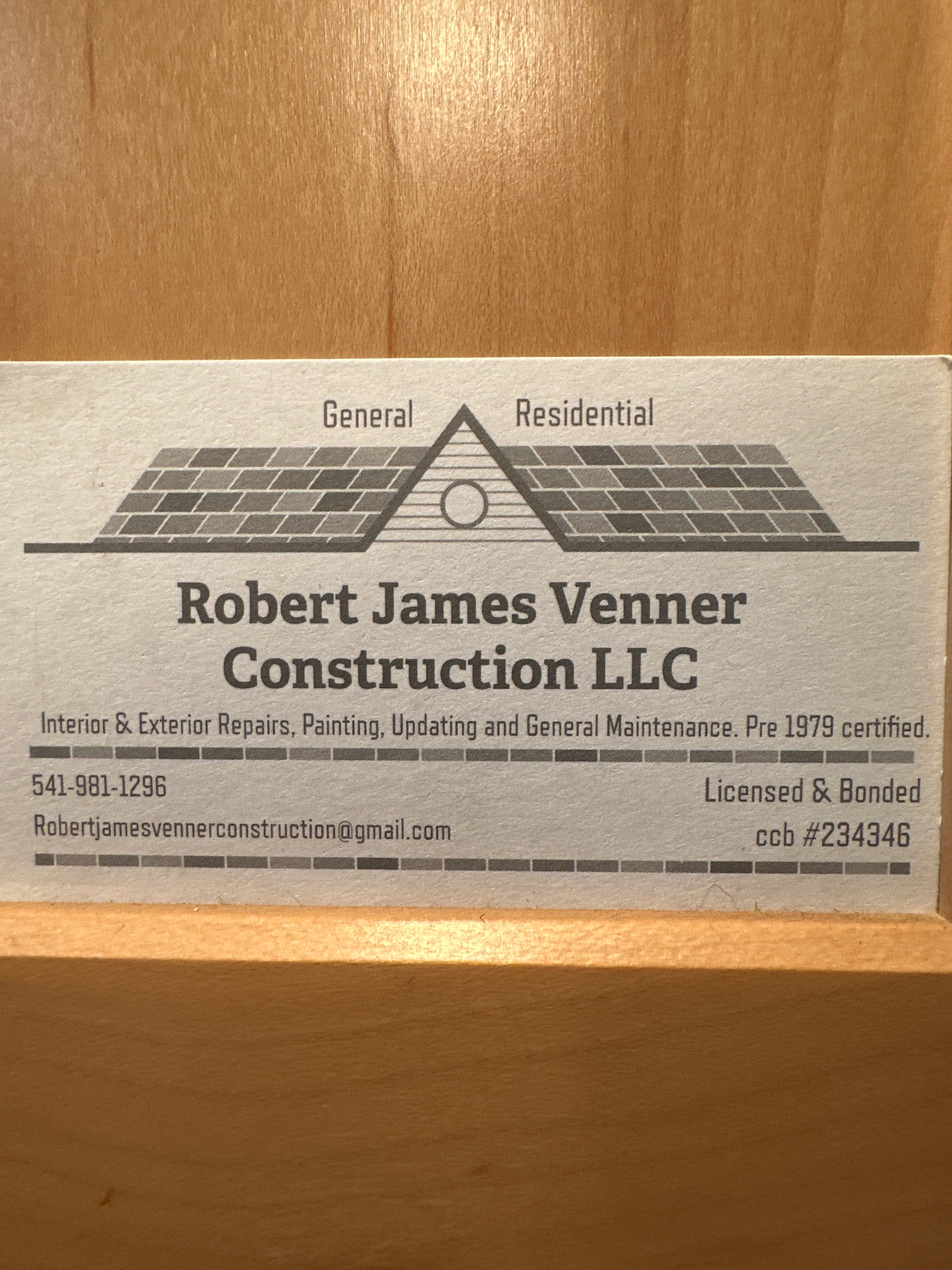 Robert James venner construction logo