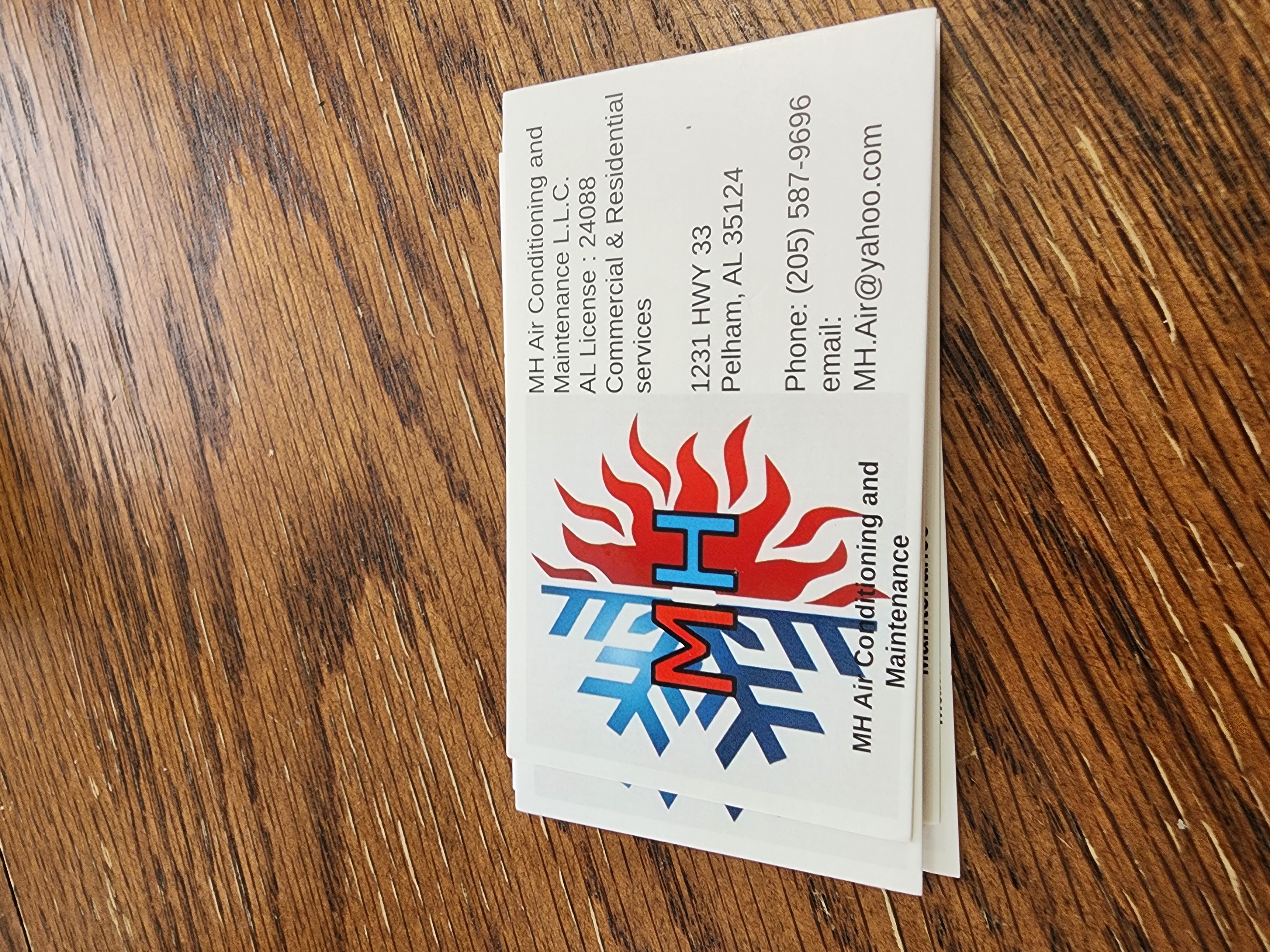 HM air conditioning and maintenance logo