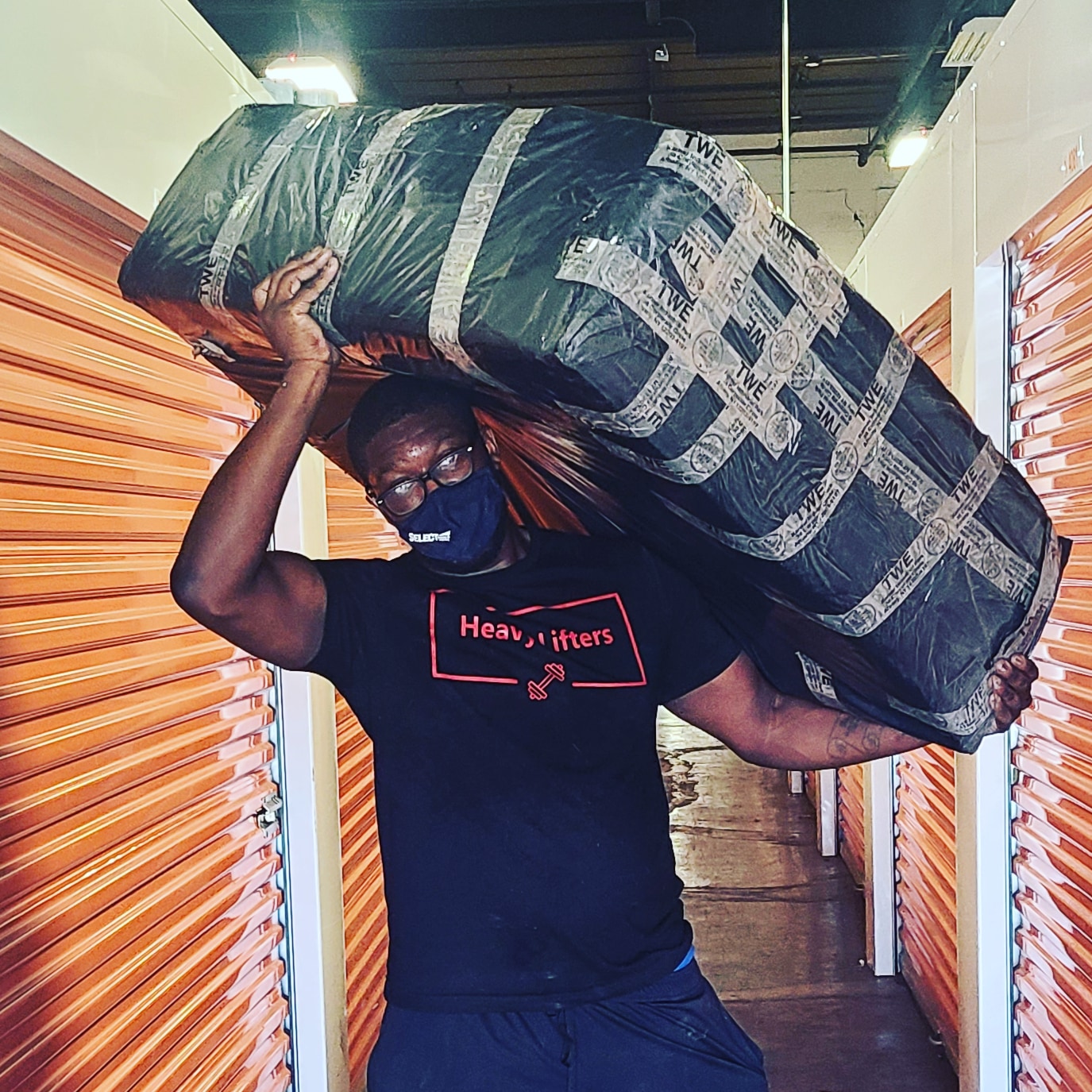 Heavy Lifters logo