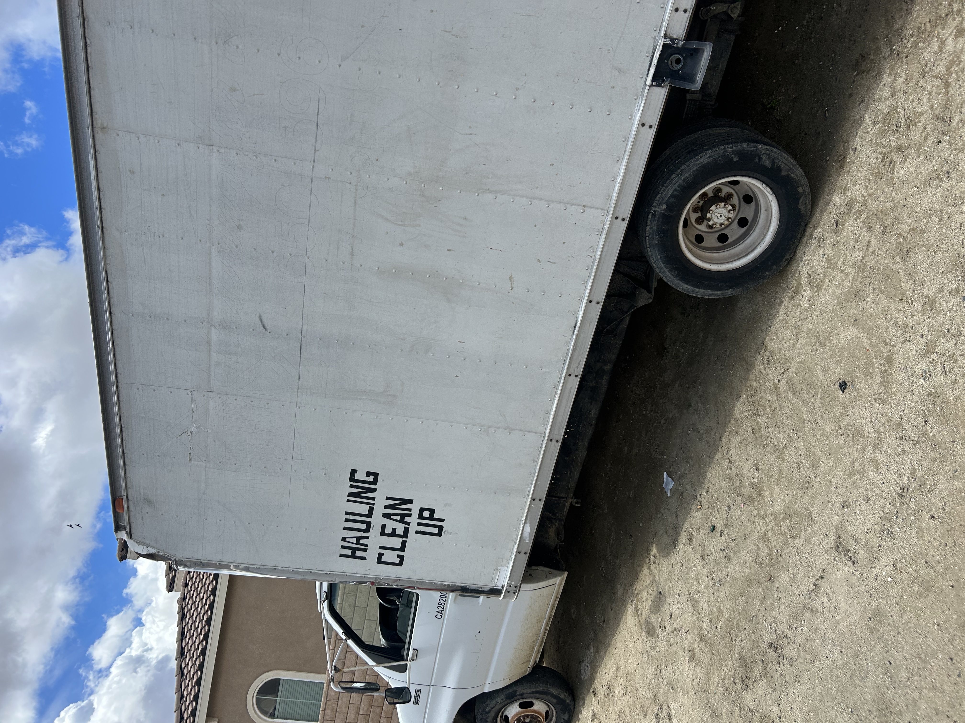 Bwell towing and junk removal logo