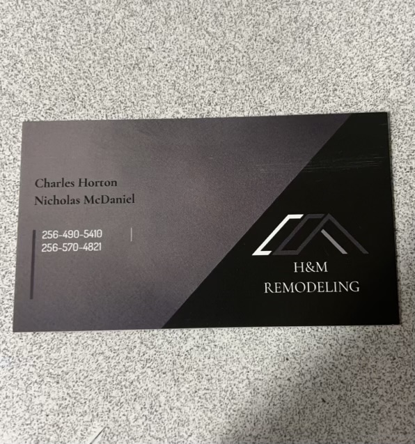 H & M REMODELING logo