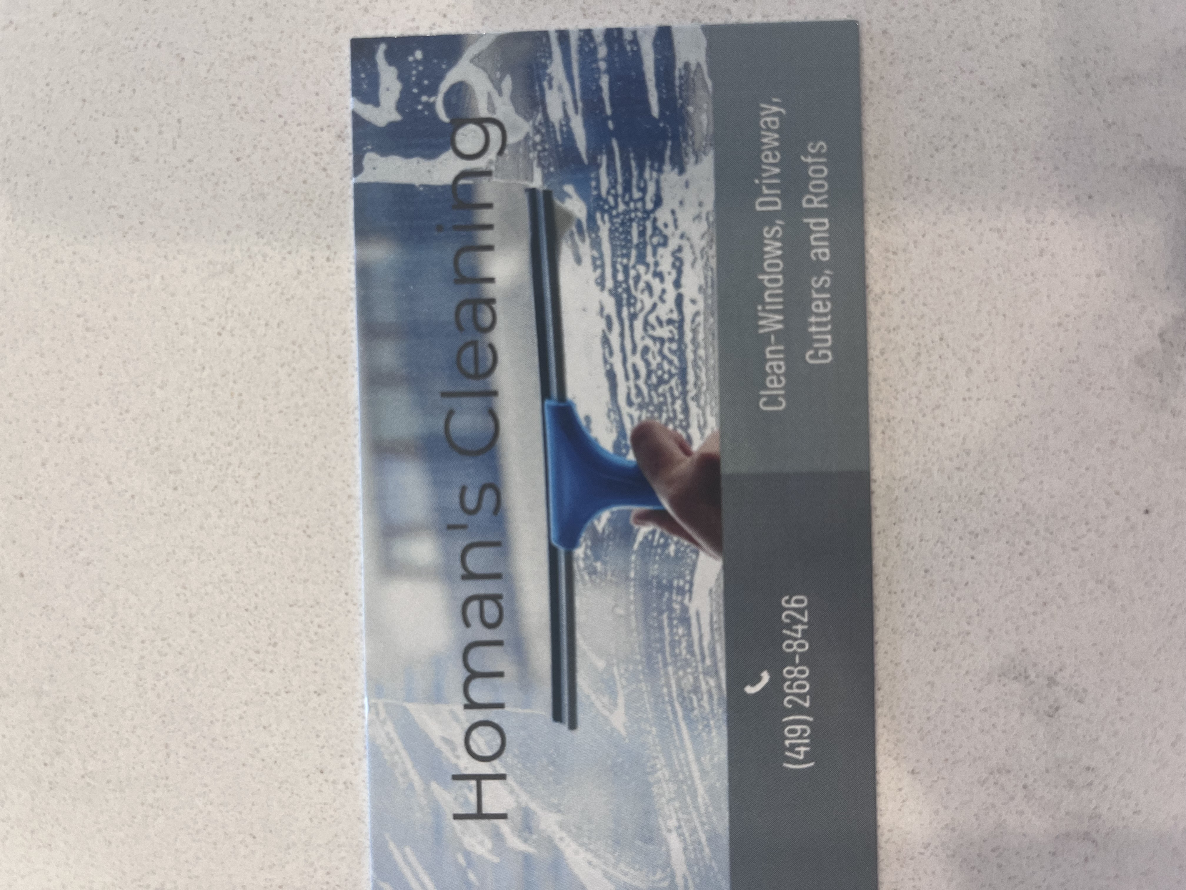 Homans Cleaning logo