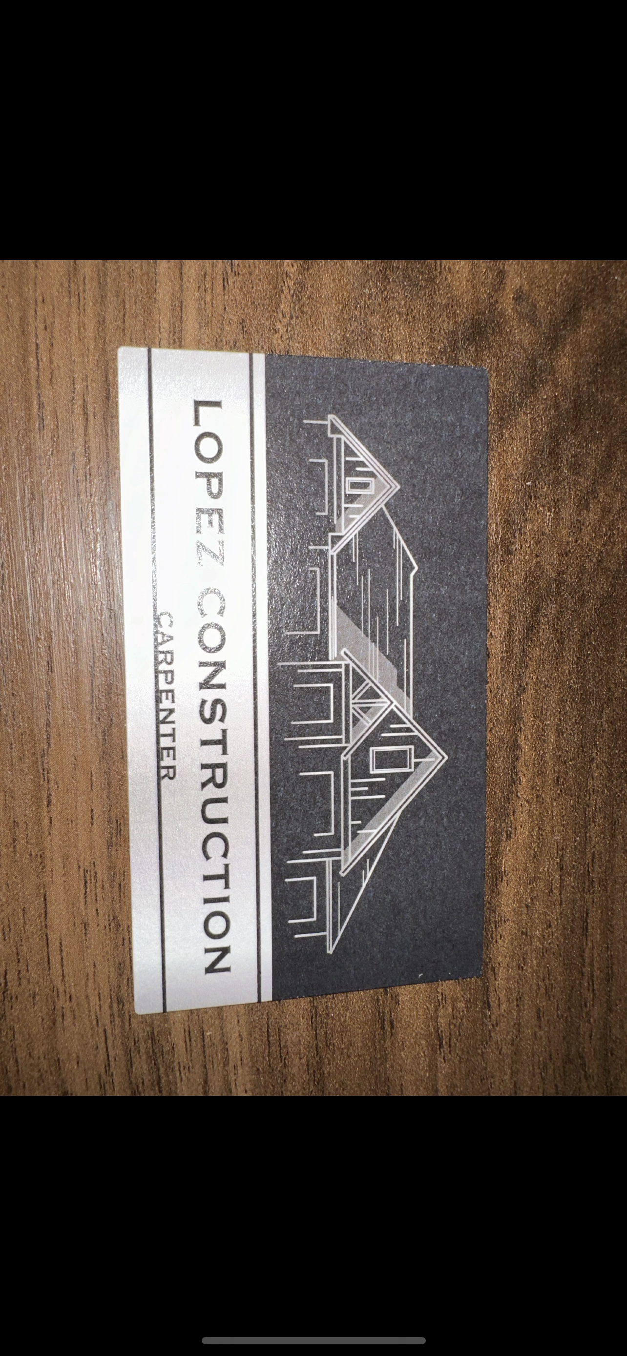 lopez construction carpenter logo