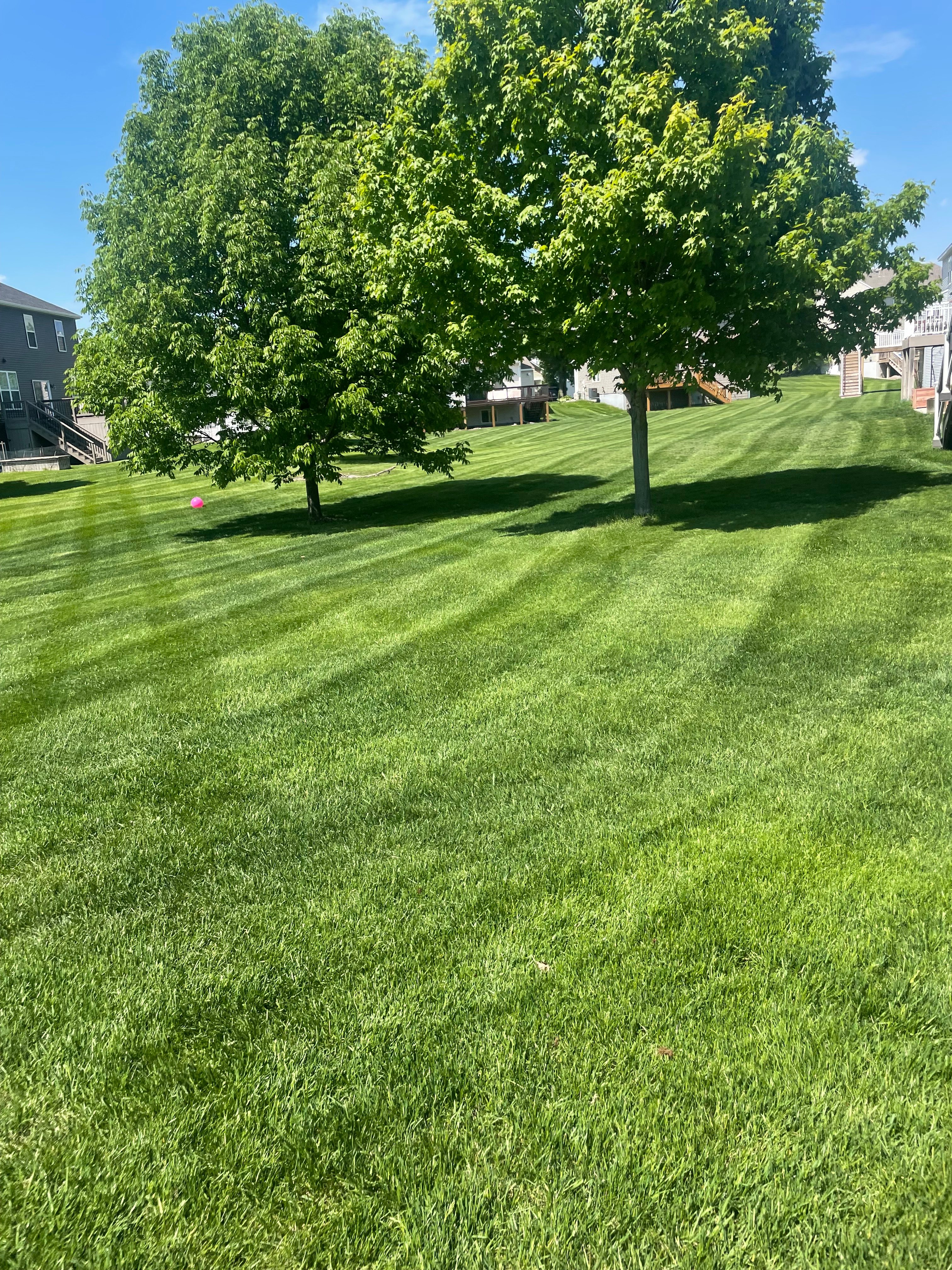Lands of lawns logo