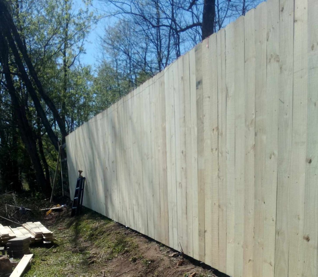 Moore fence logo