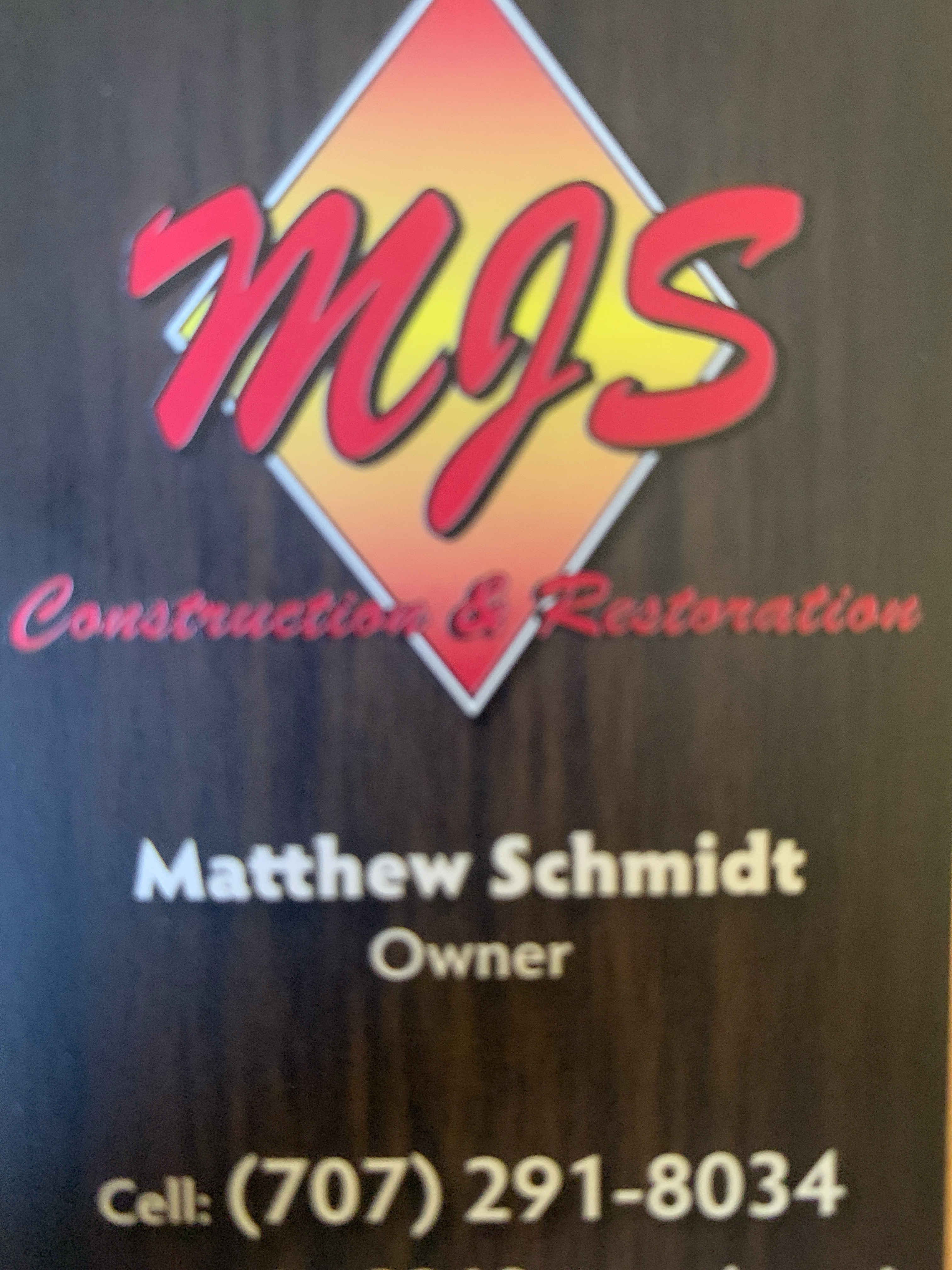 MJS Construction & Restoration logo