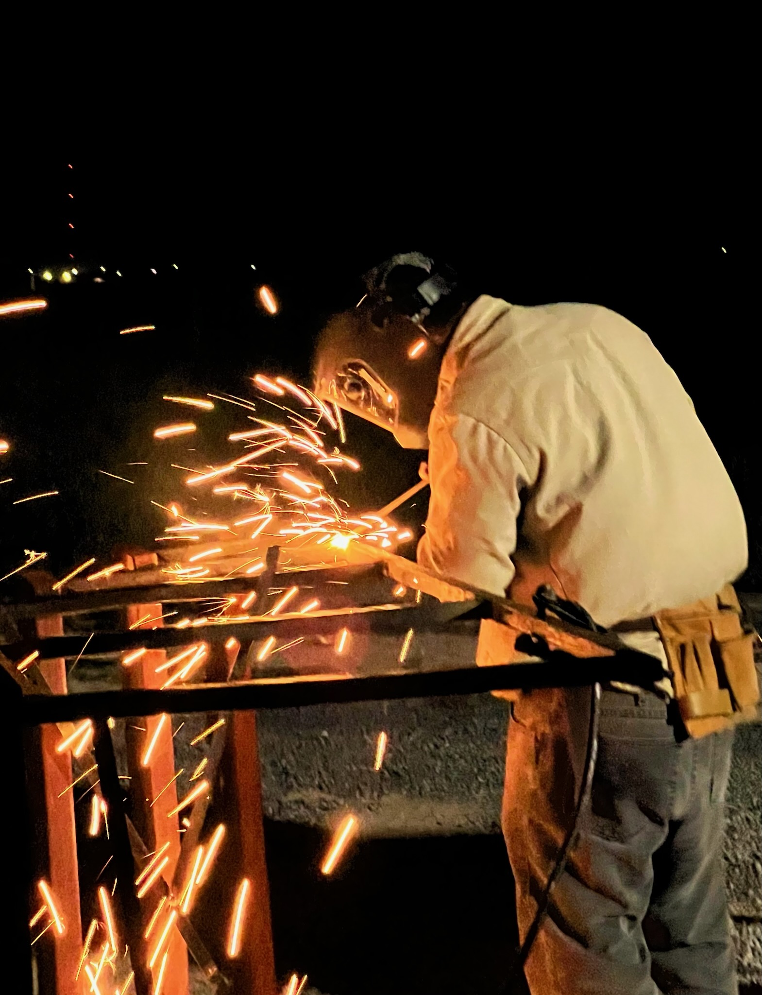 Hernandez remodeling and welding logo