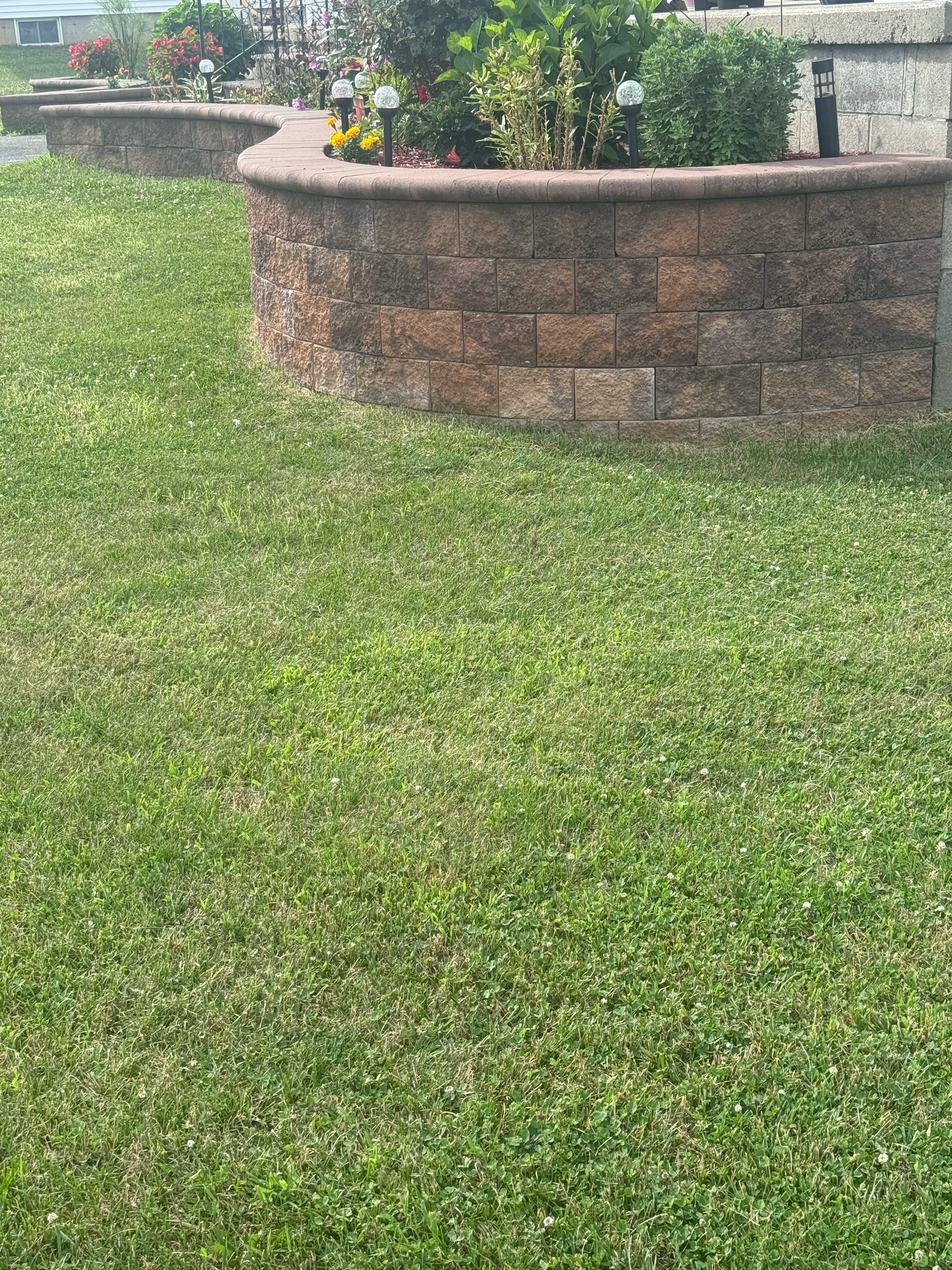 Ortiz Landscaping and Housecleaning logo