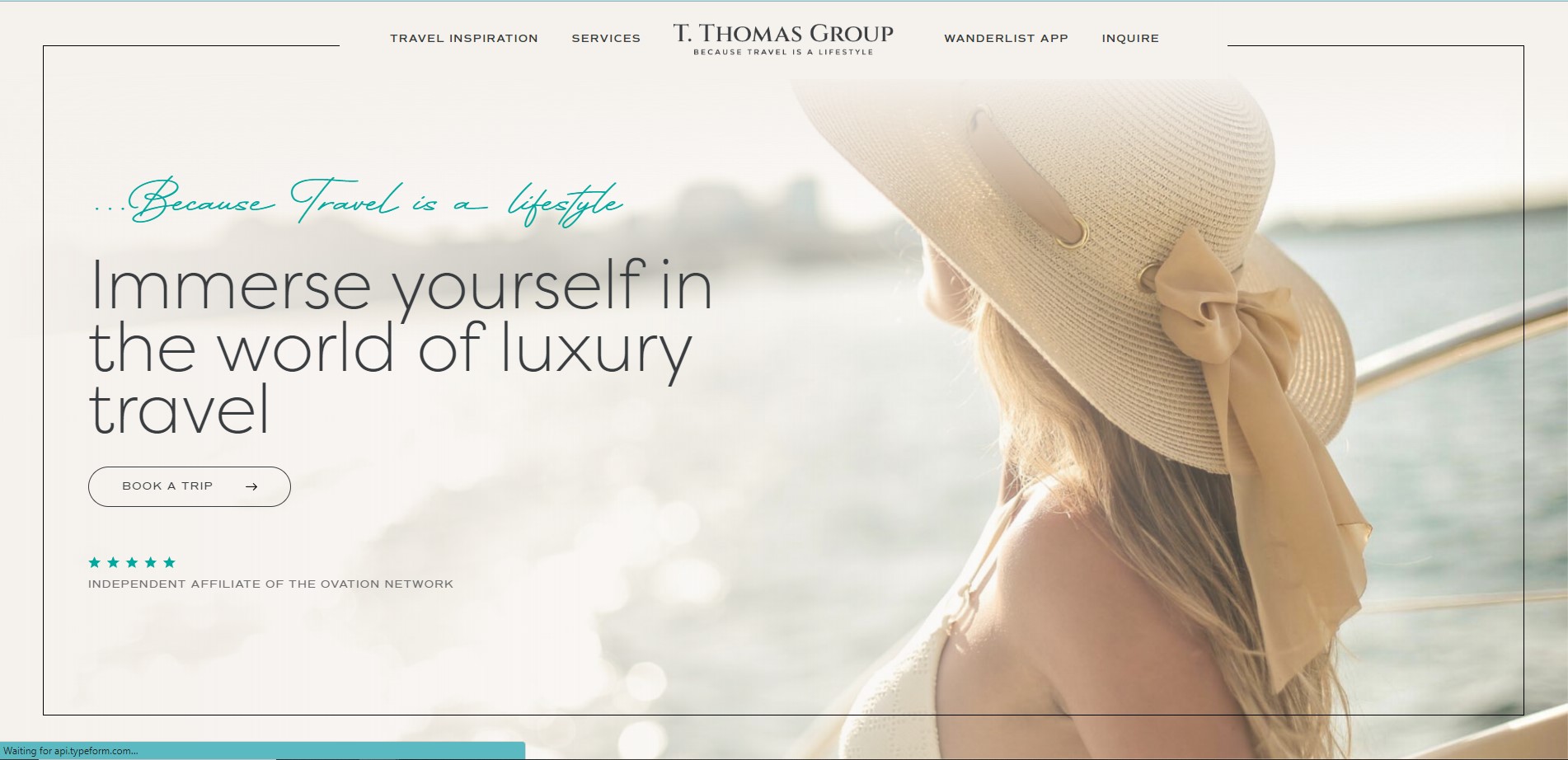 T Thomas Group Luxury Travel Agency logo