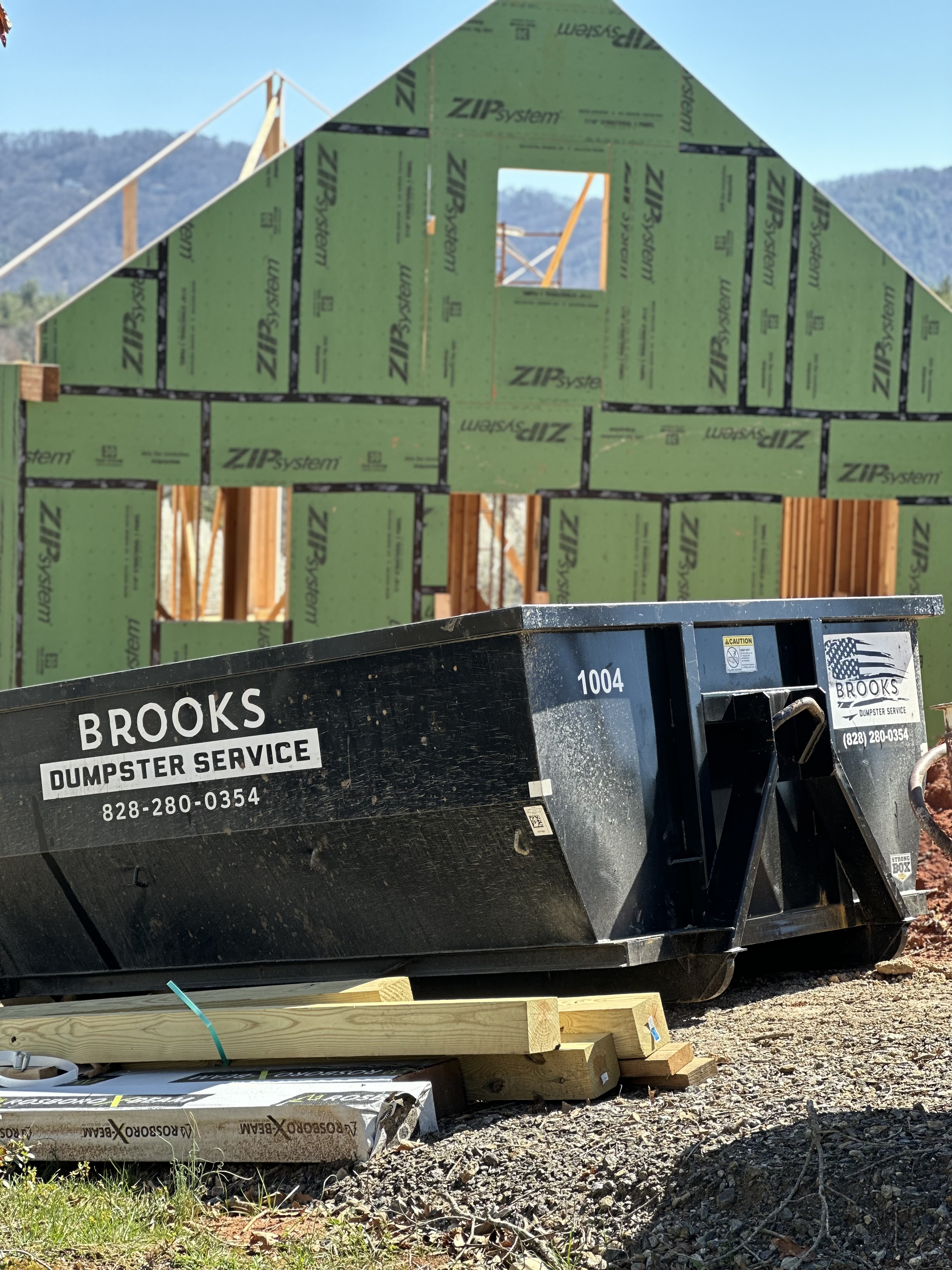 Brooks dumpster service logo