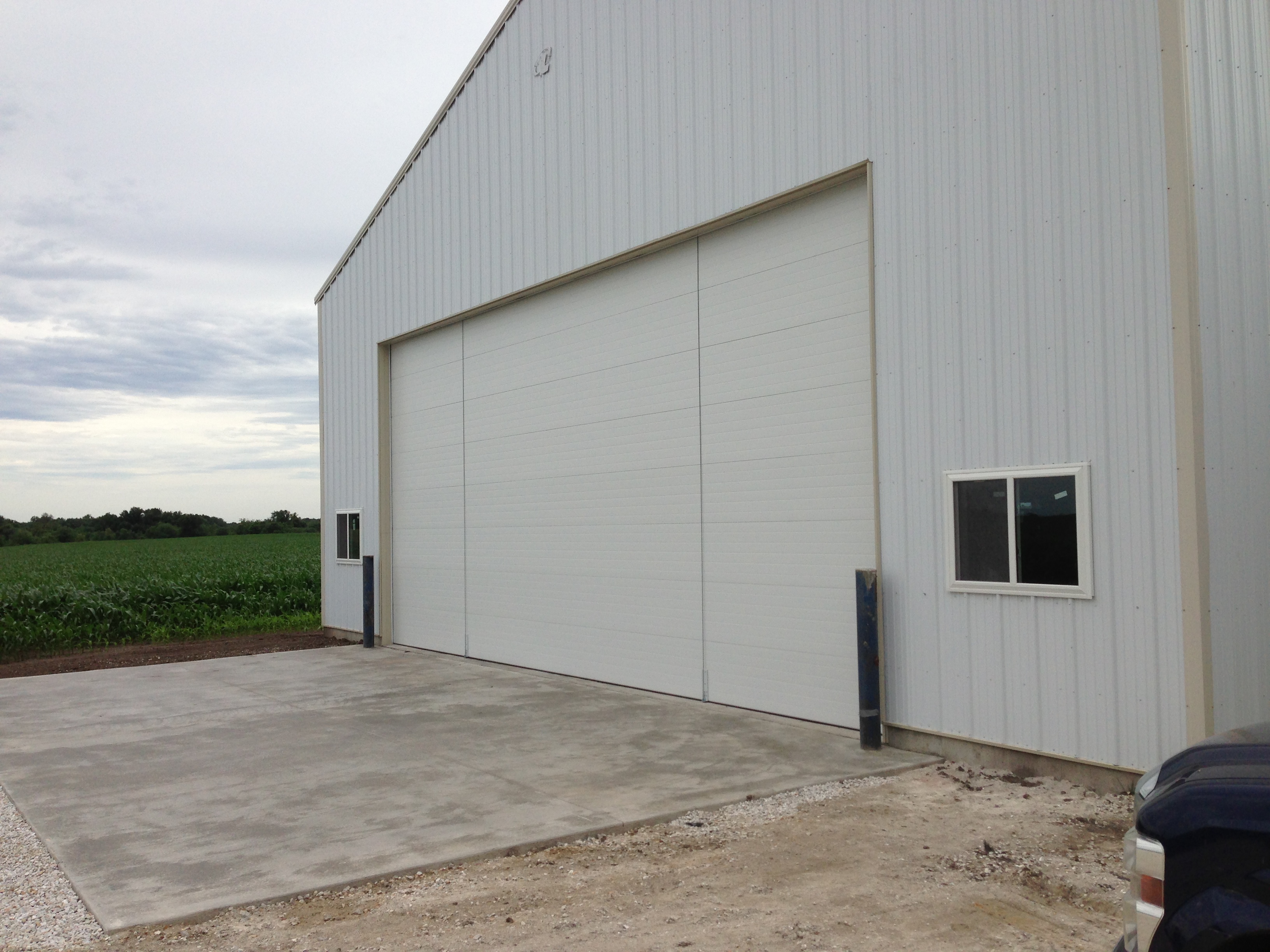 Pridemore Garage Doors logo