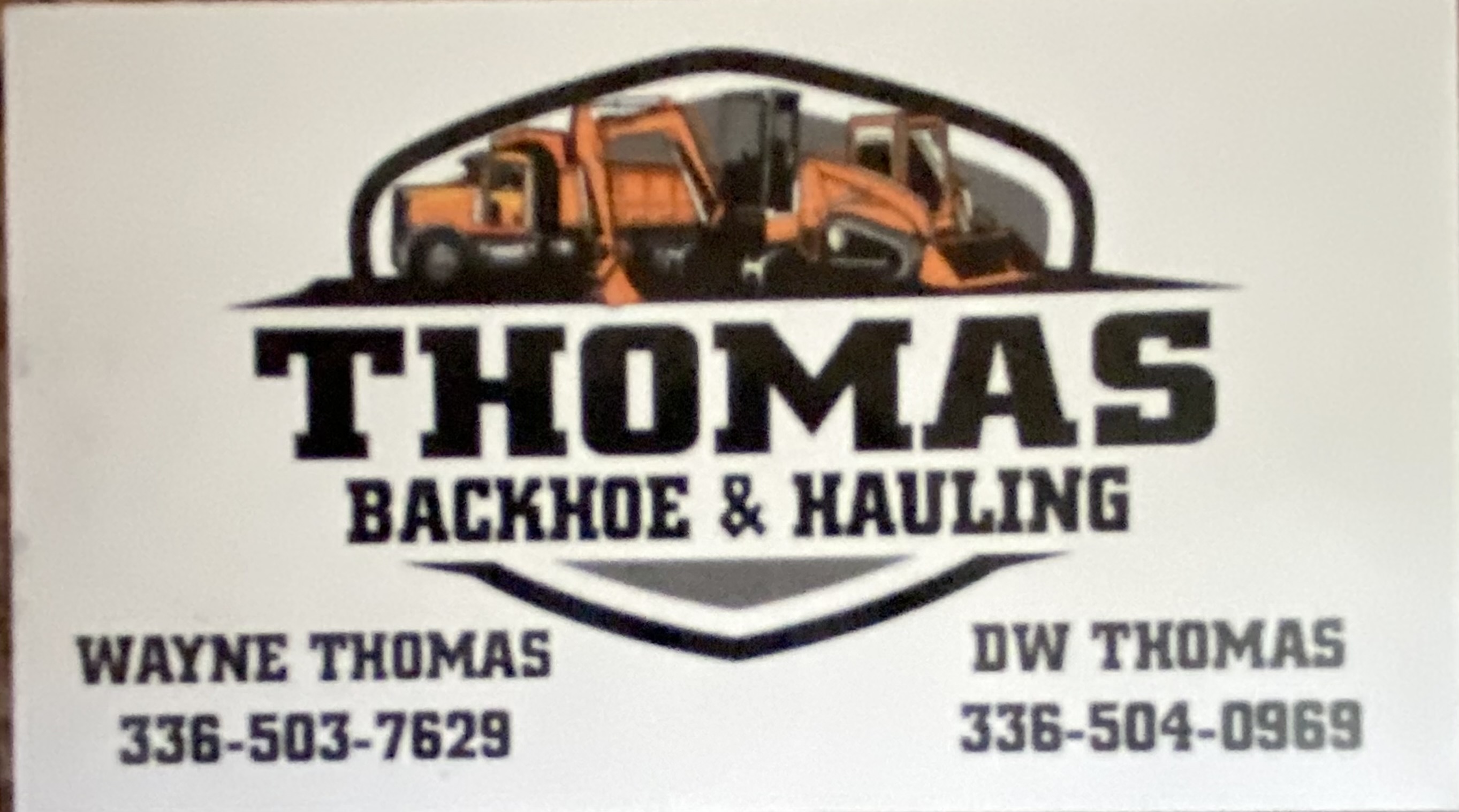 Thomas Backhoe & Hauling logo