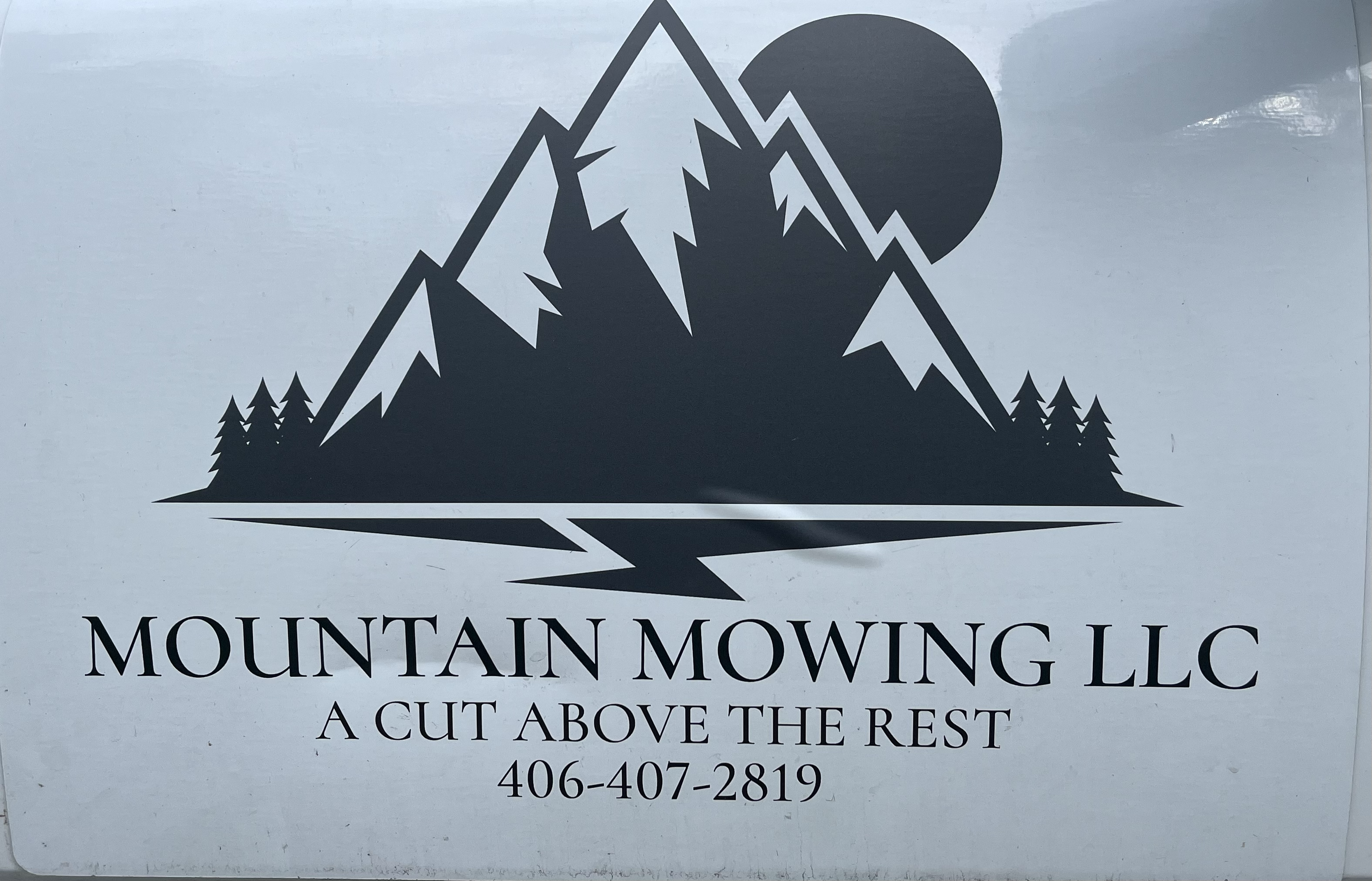 Mountain Mowing logo