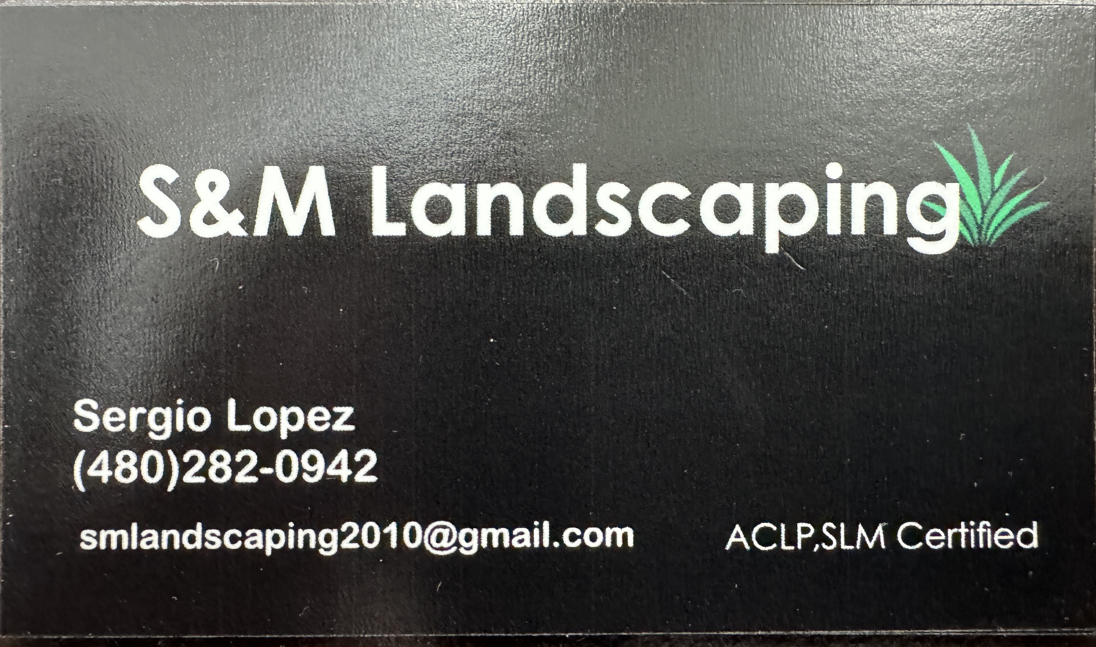 S&M landscaping logo