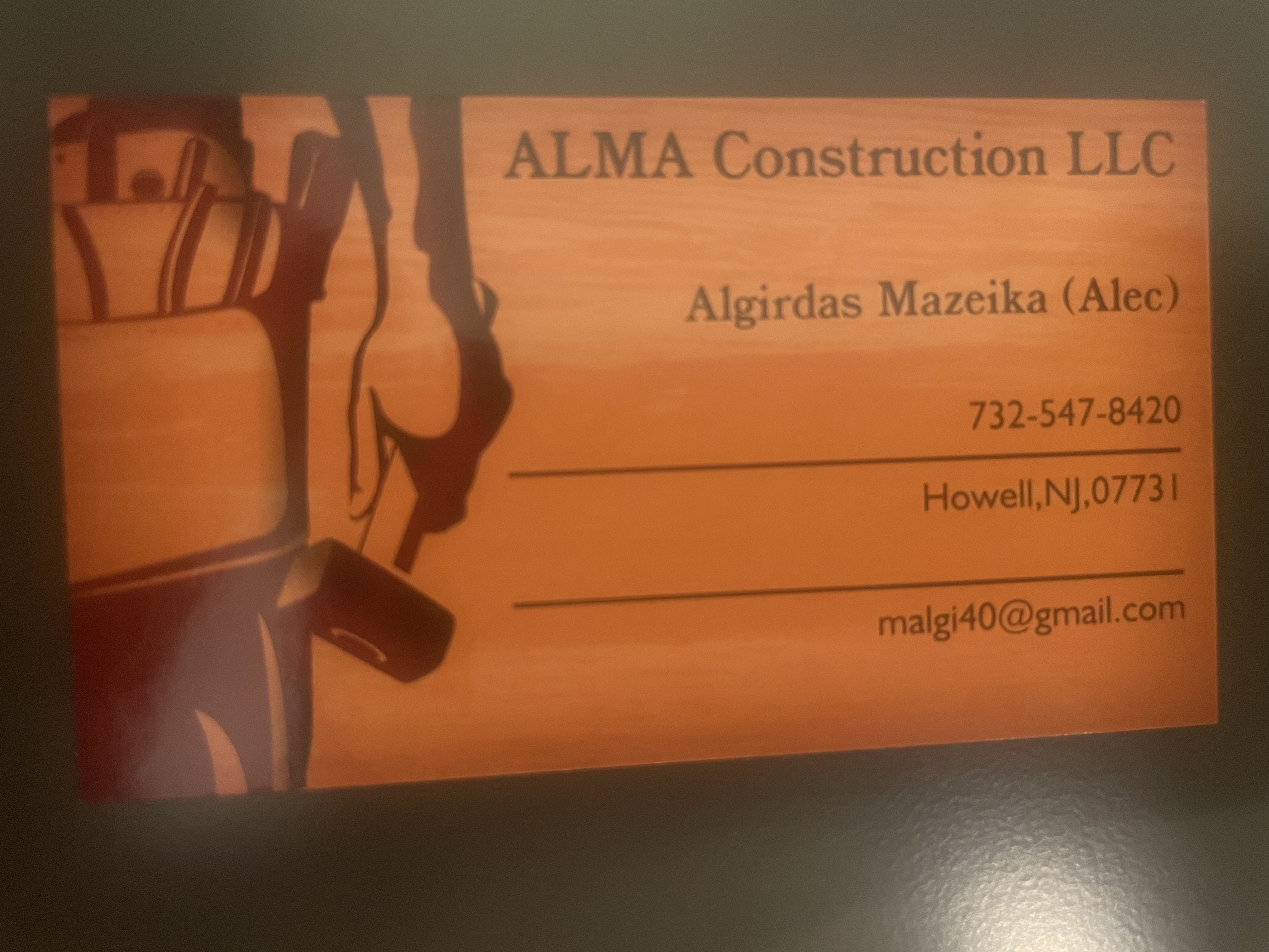 ALMA Construction LLC logo